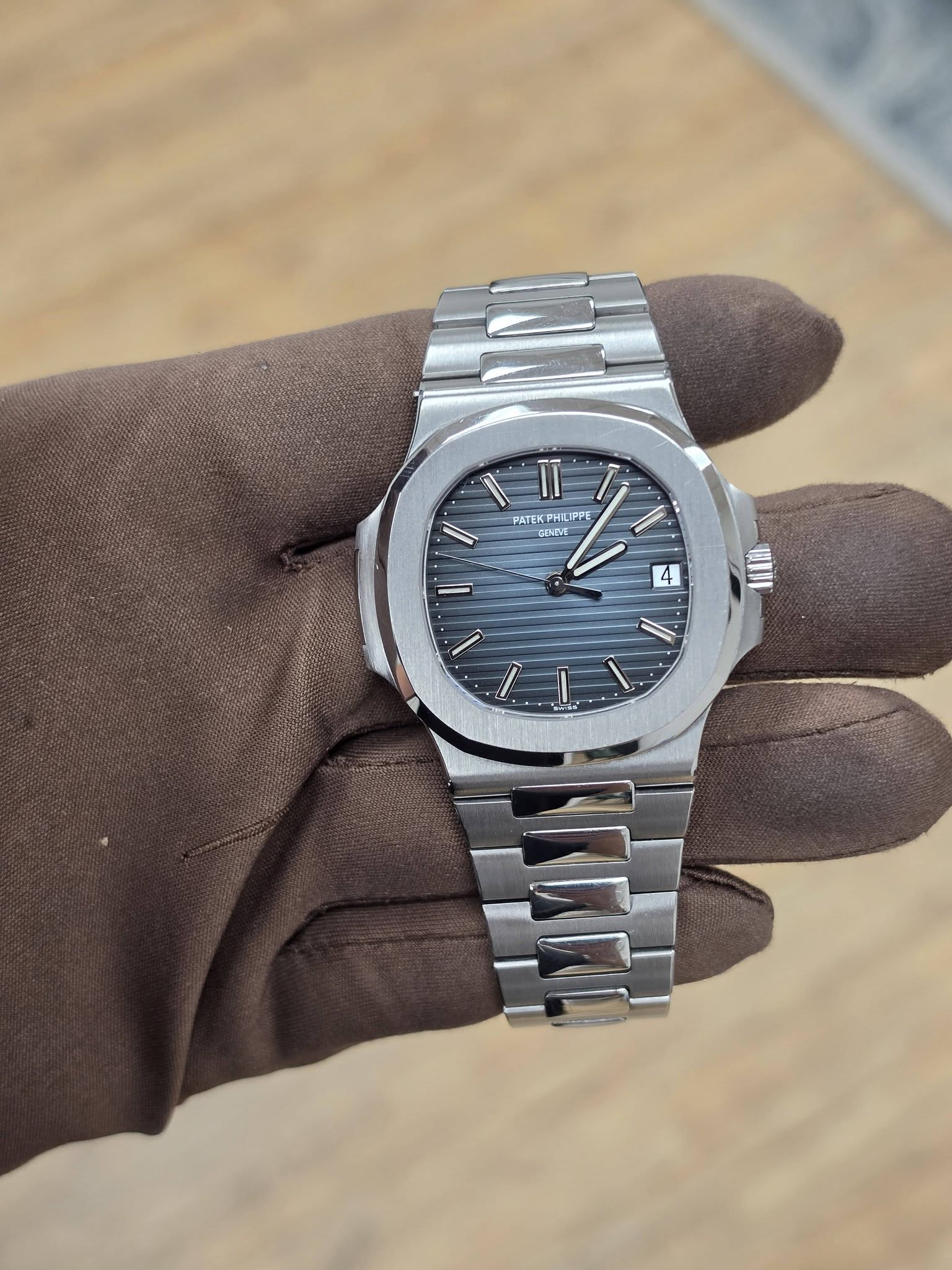 May be an image of wrist watch and text