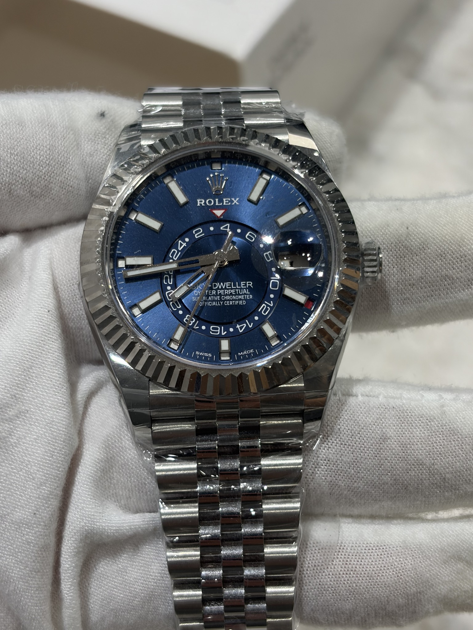 May be an image of wrist watch and text