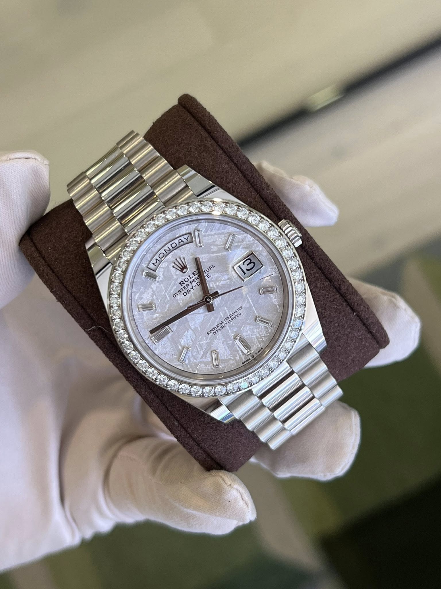 May be an image of wrist watch and text