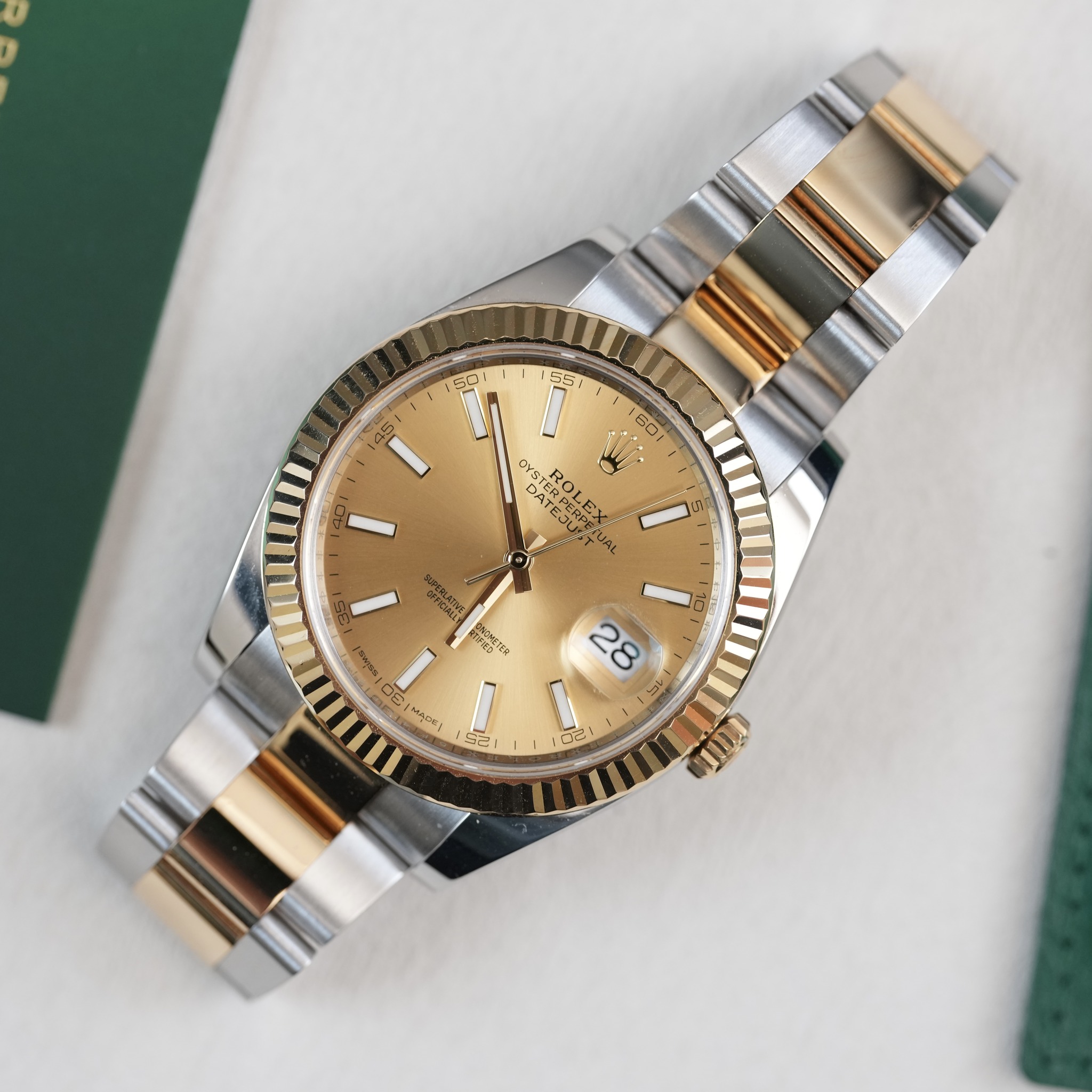 May be an image of wrist watch and text