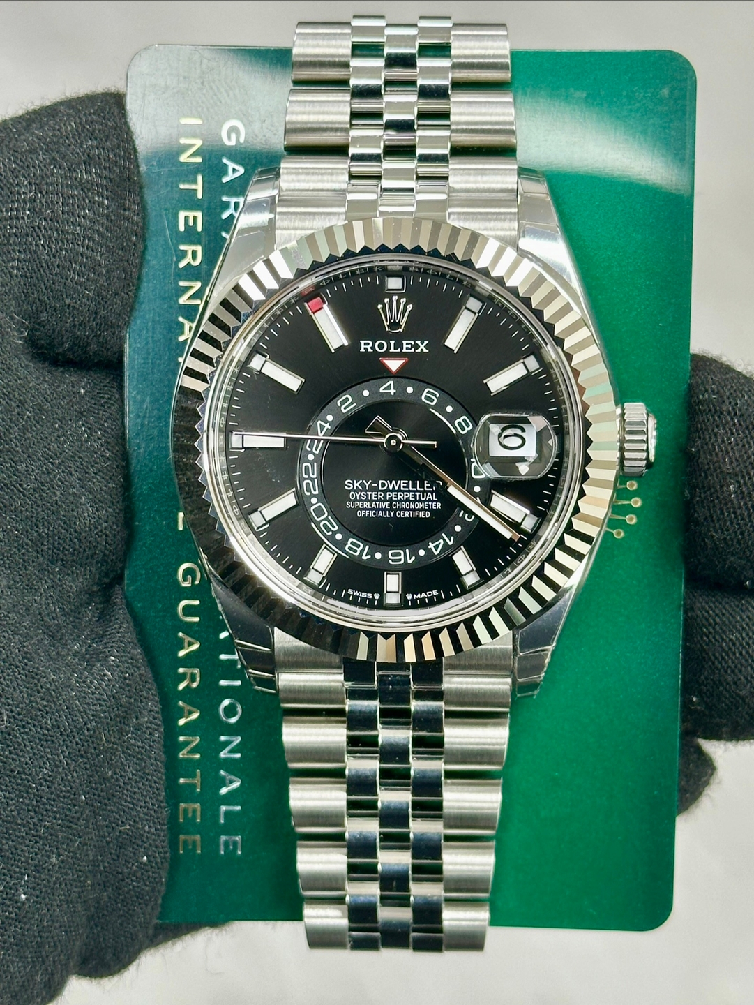 May be an image of wrist watch and text that says 'NTER GAR G N A Vy ROLEX 4 8 6 V E4 E 22 SKY-DWELLE LE, OYSTER RPETUAL UAL YSTERPER PERPET DETUGL 20 CUFENL LATIVECHDONONET…
