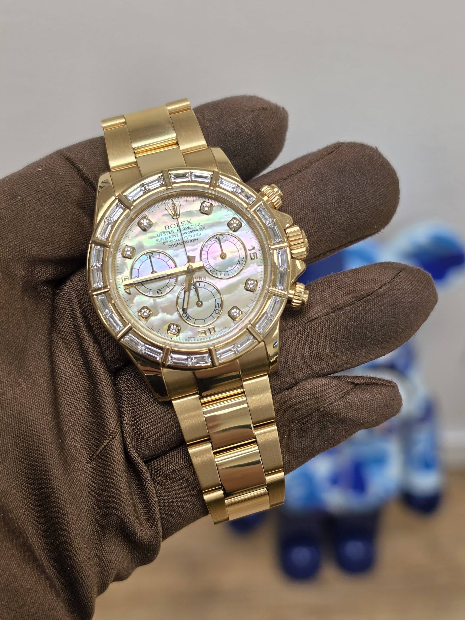 May be an image of wrist watch and text