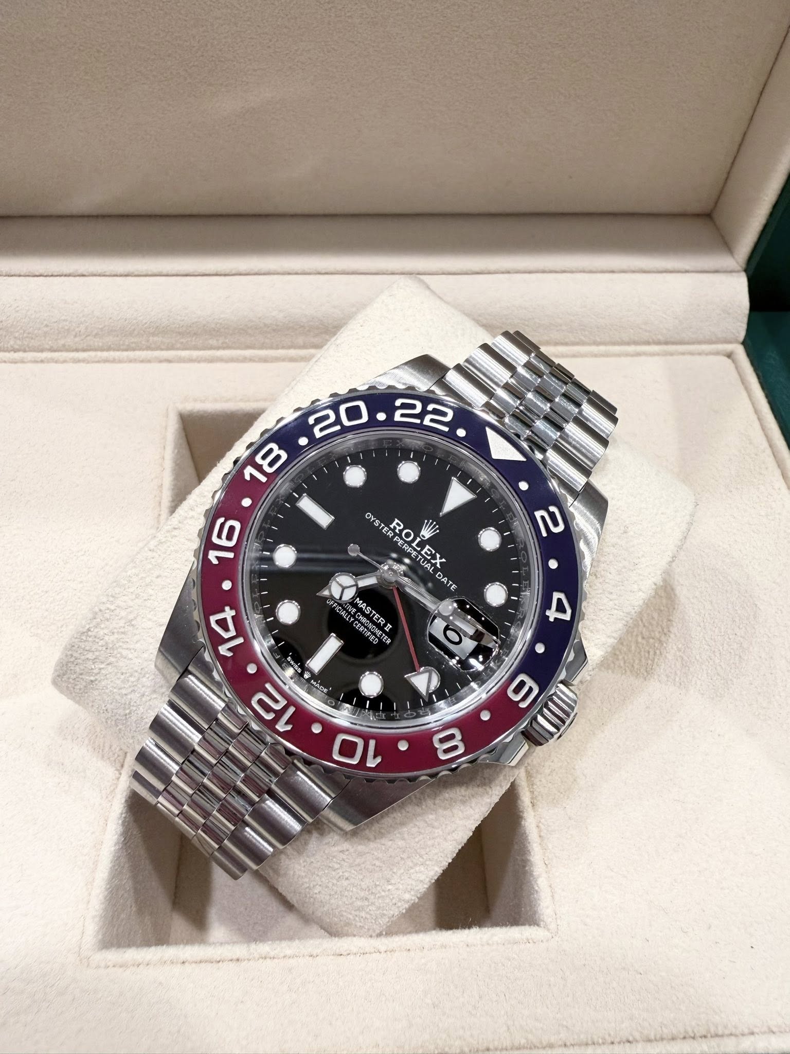 May be an image of wrist watch and text