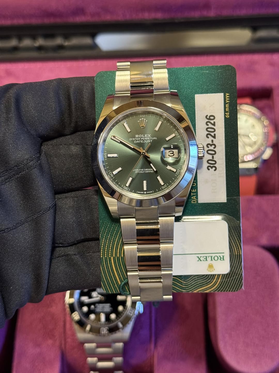 May be an image of wrist watch and text