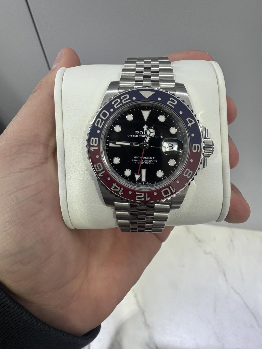May be an image of wrist watch and text that says ' ROL OL OYSTERFE OYSTF FERP DAT ASTERI O0 ល'