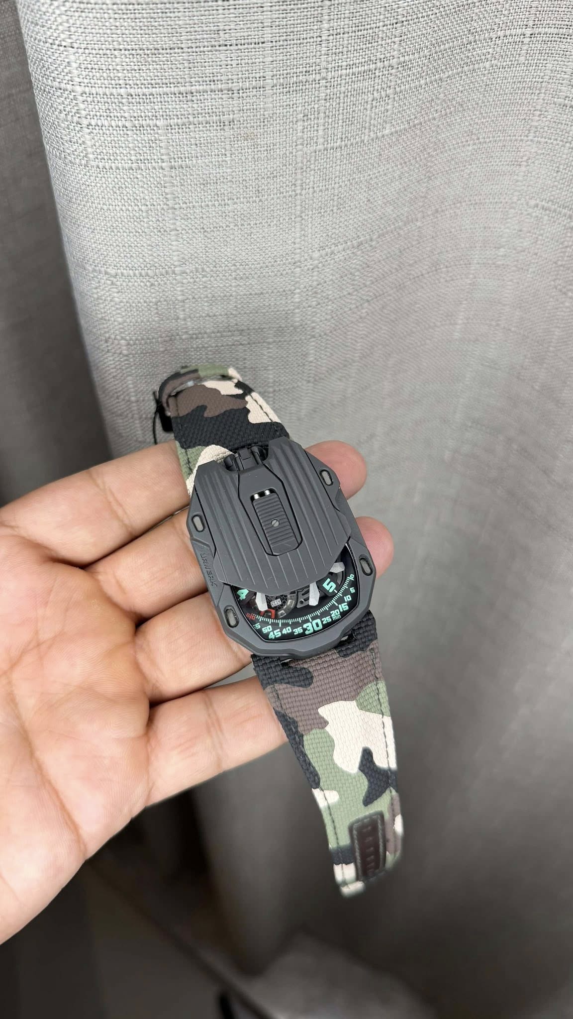 May be an image of digital watch and text