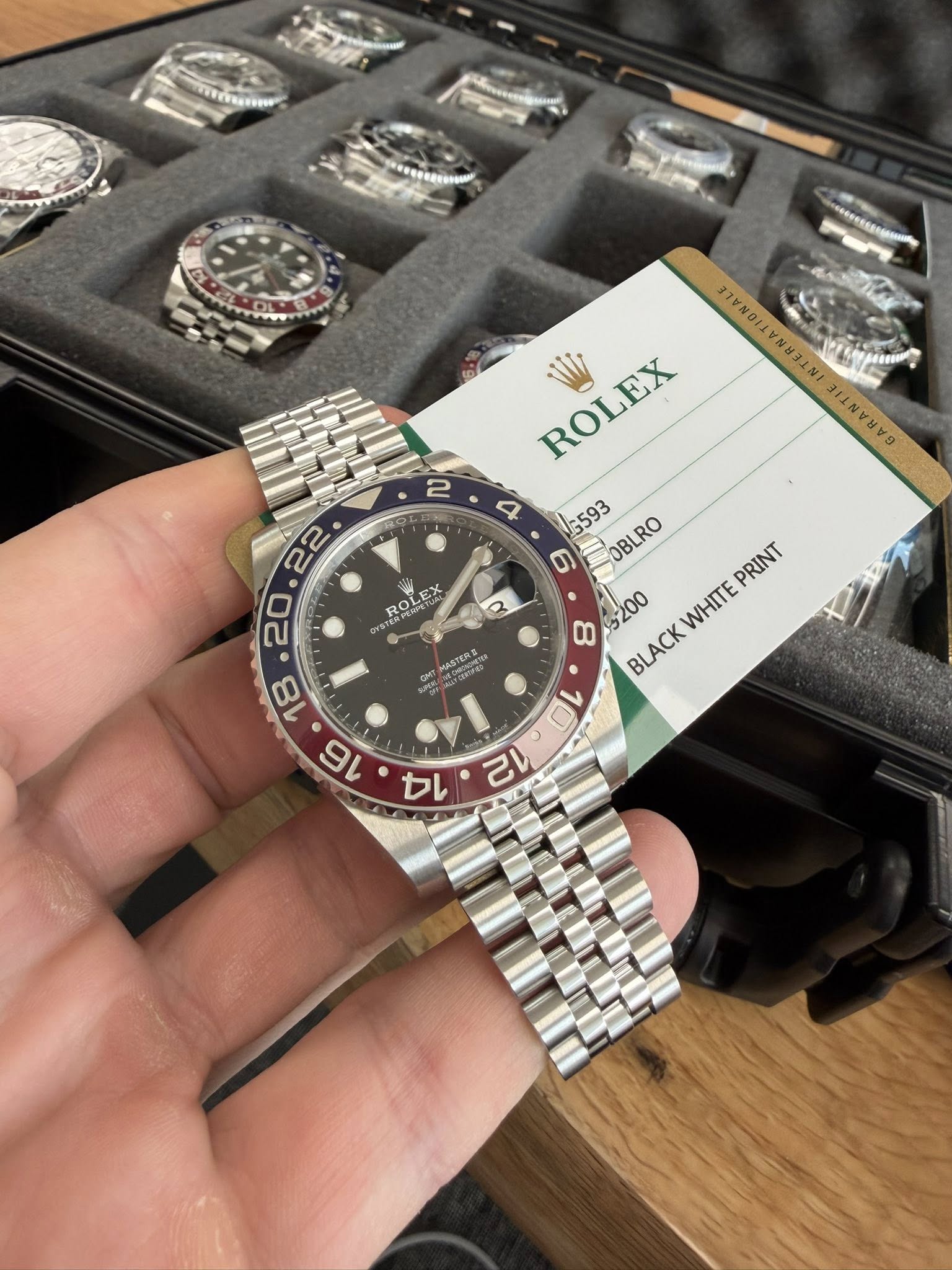 May be an image of wrist watch and text