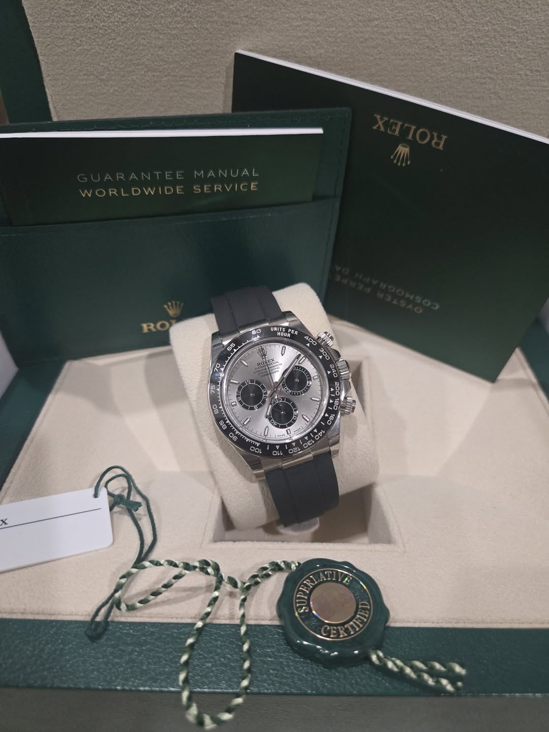 May be an image of wrist watch and text