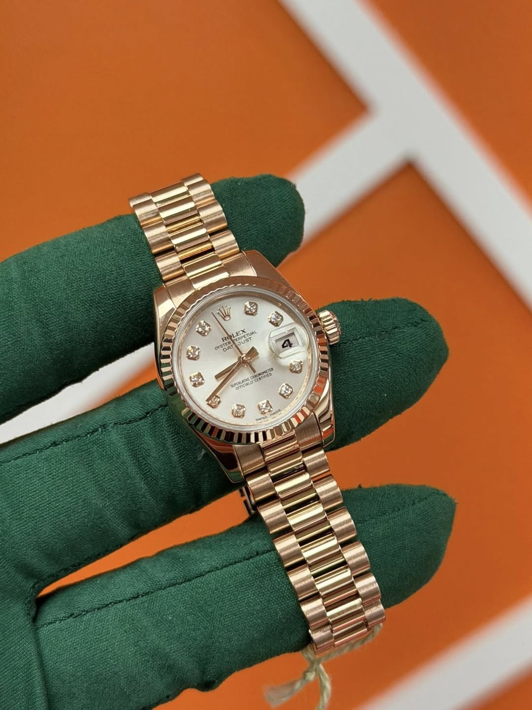 May be an image of wrist watch and text