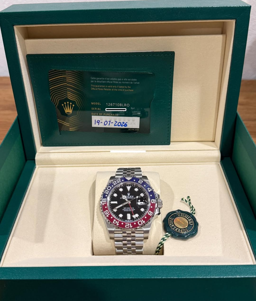 May be an image of wrist watch and text that says 'W 126710BLR RO 一 טח 4 OLEX ៣ L T 8 10 12 CELILERE TadO'