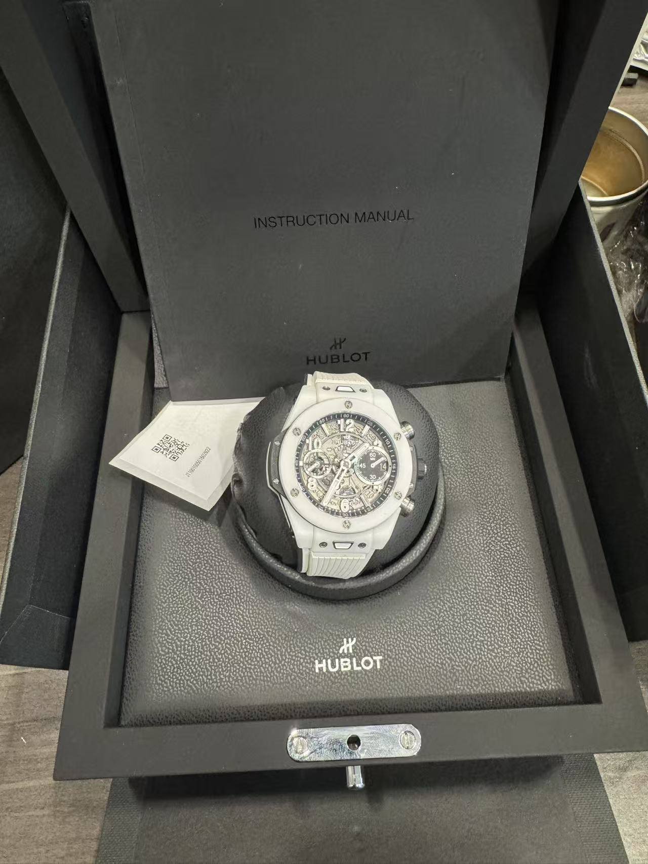 May be an image of wrist watch and text