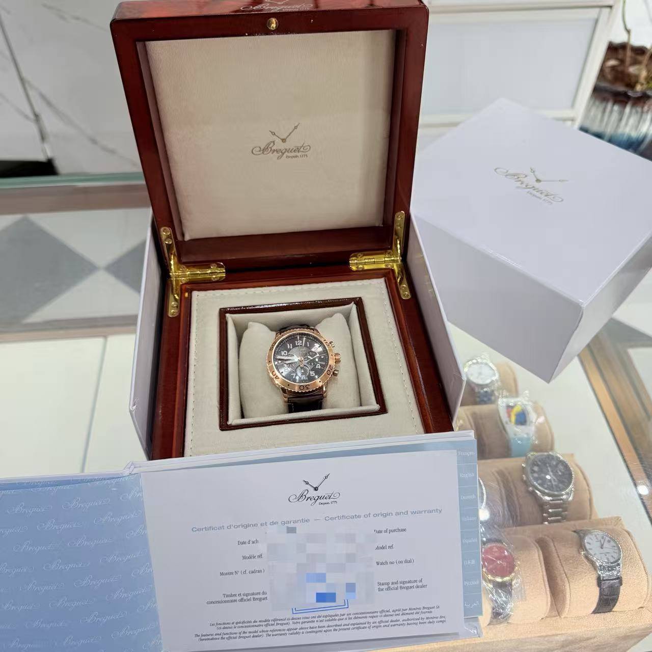 May be an image of wrist watch and text