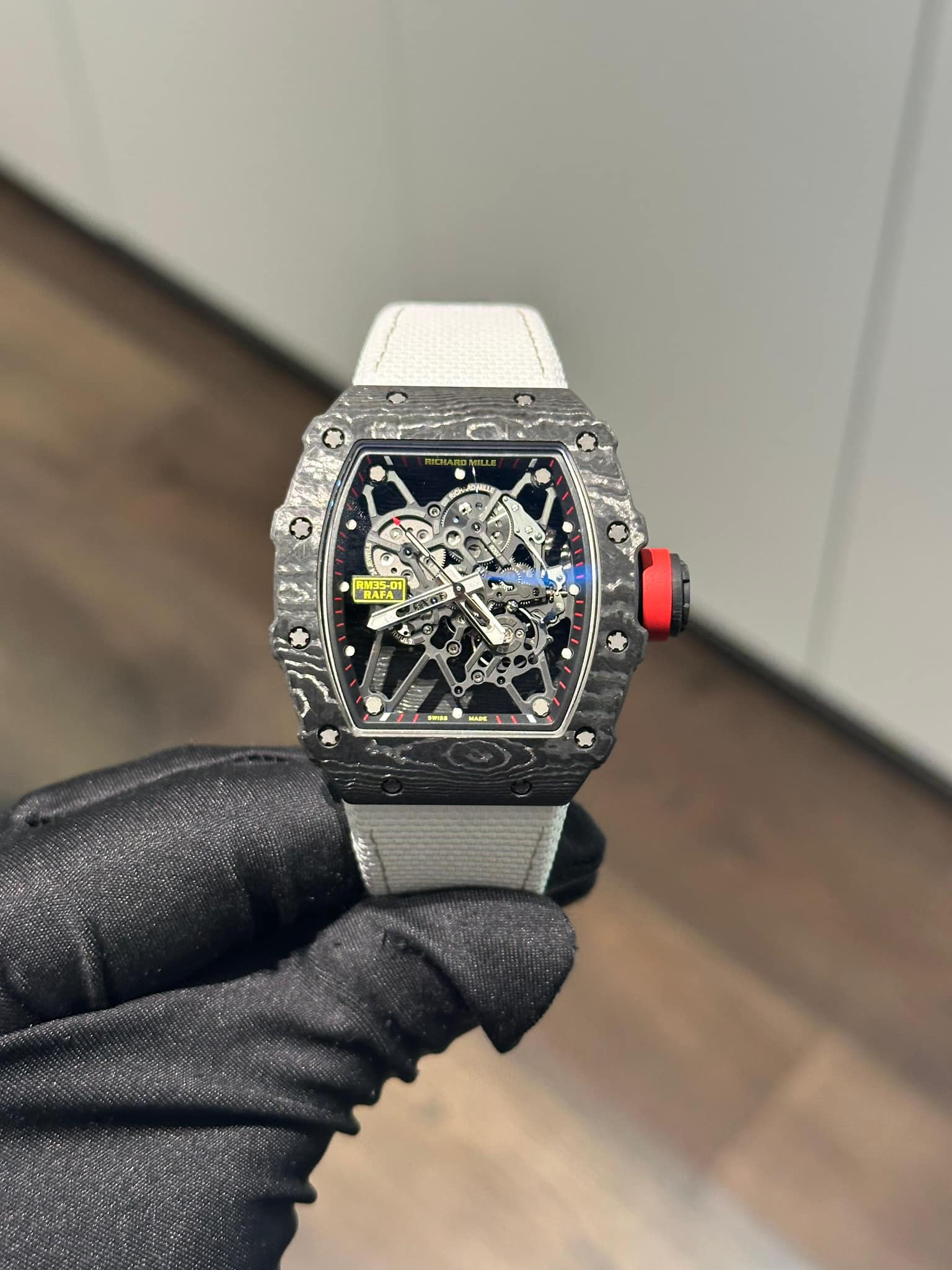 May be an image of wrist watch and text