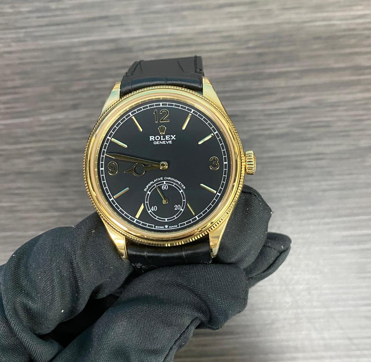 May be an image of wrist watch and text