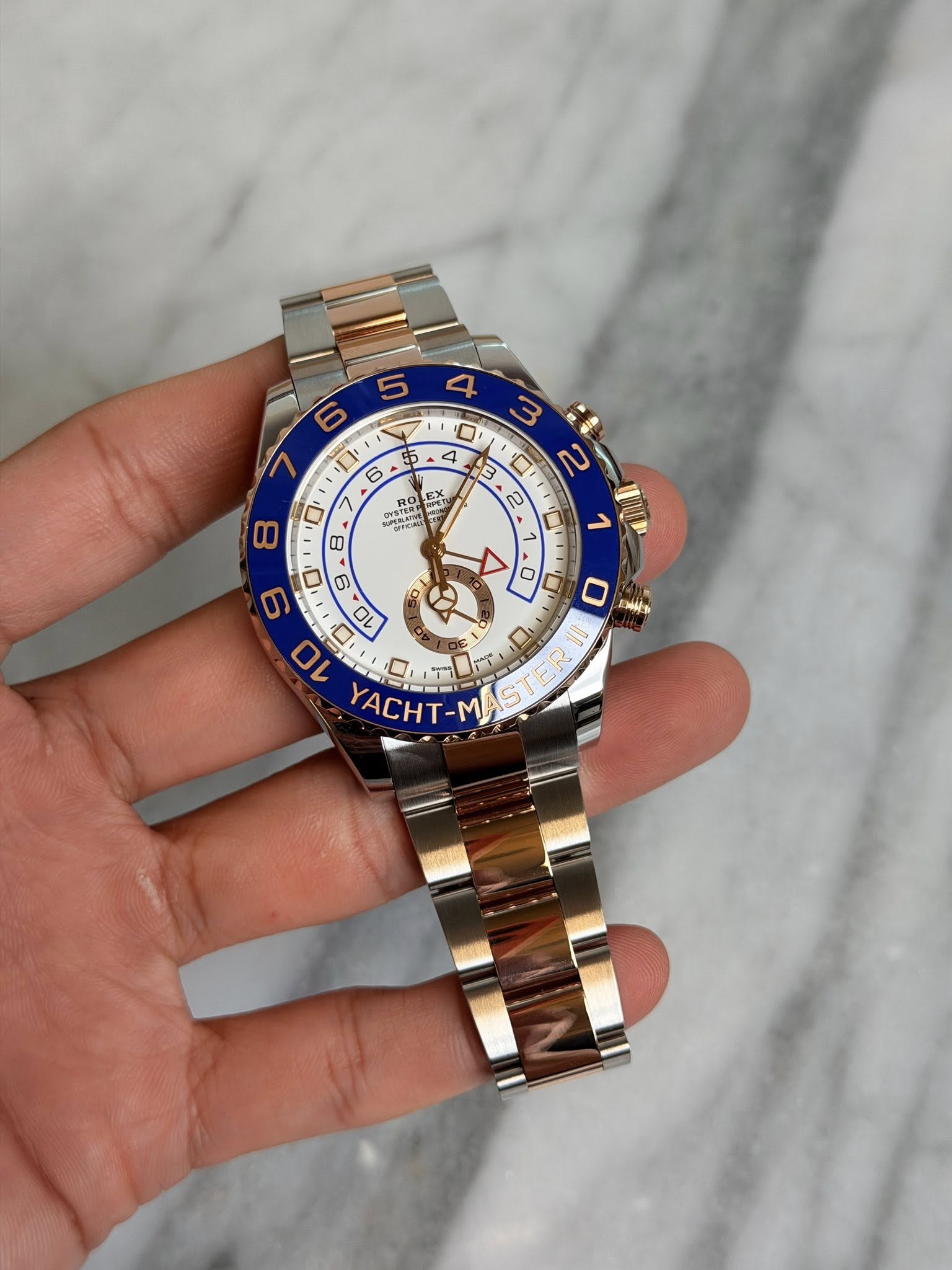 May be an image of wrist watch and text that says '5 6 55 6 RO o E PEER e YSTER 3 ב 8 2 1 WEP X 0 על Md XACH-MA X ACHT ማማ UUS e سم'