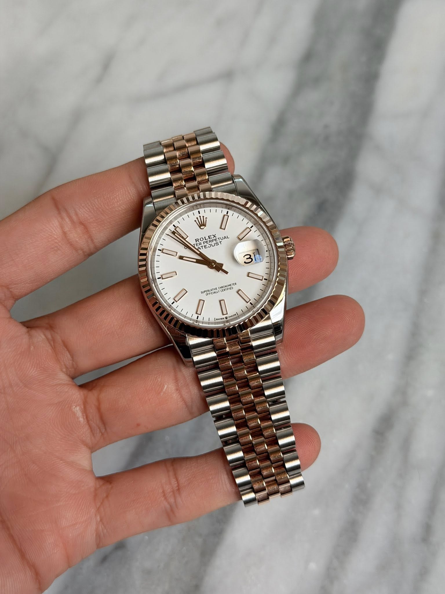 May be an image of wrist watch