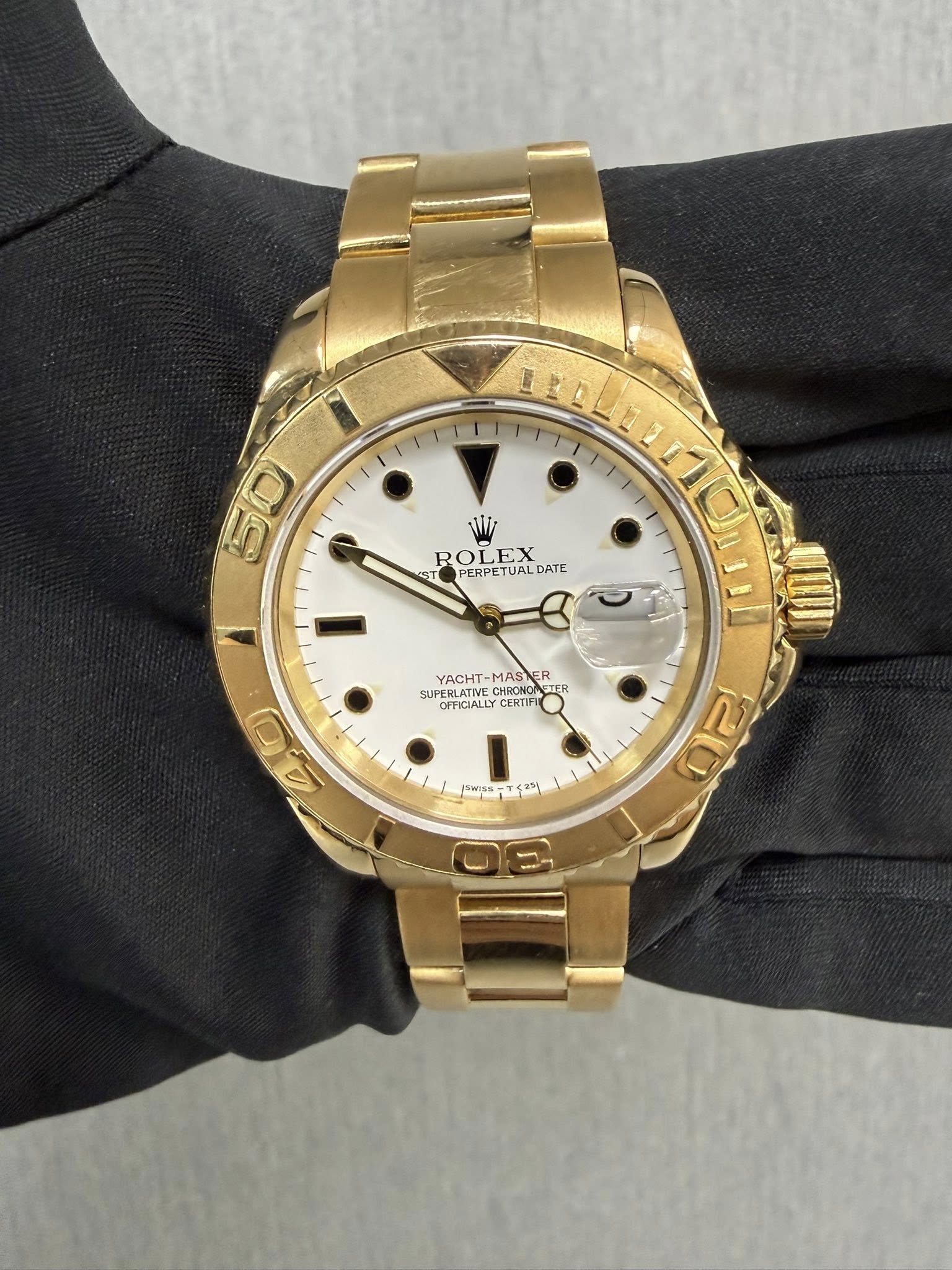 May be an image of wrist watch and text that says '50 WV ROL ROLEX জা PERPET PERPETUALDATE ETUALDAT UAL DATE UYC-MAR YACHT MAS YACHT-MASE ER UPERLATIVE YACHT-MASER YACHT-MAS…