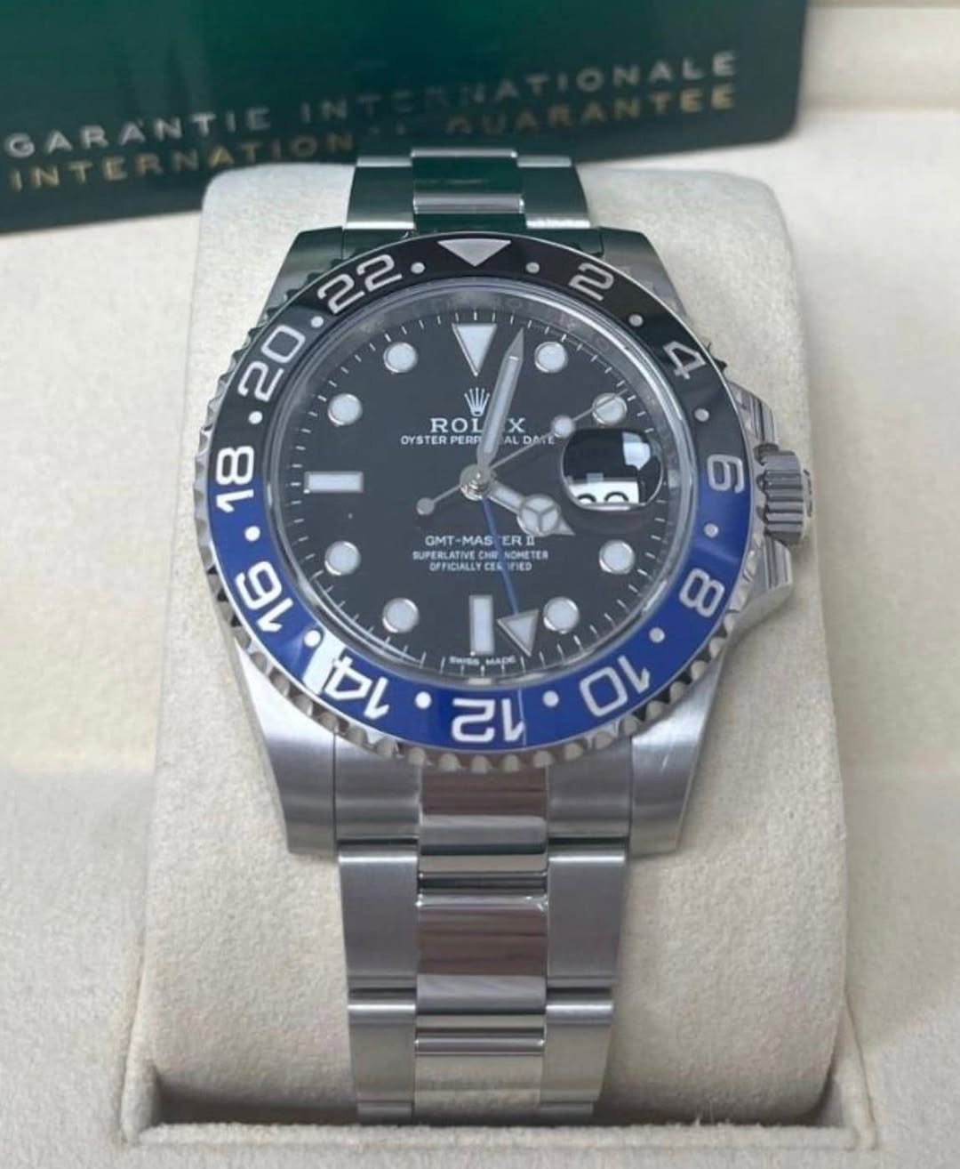 May be an image of wrist watch and text