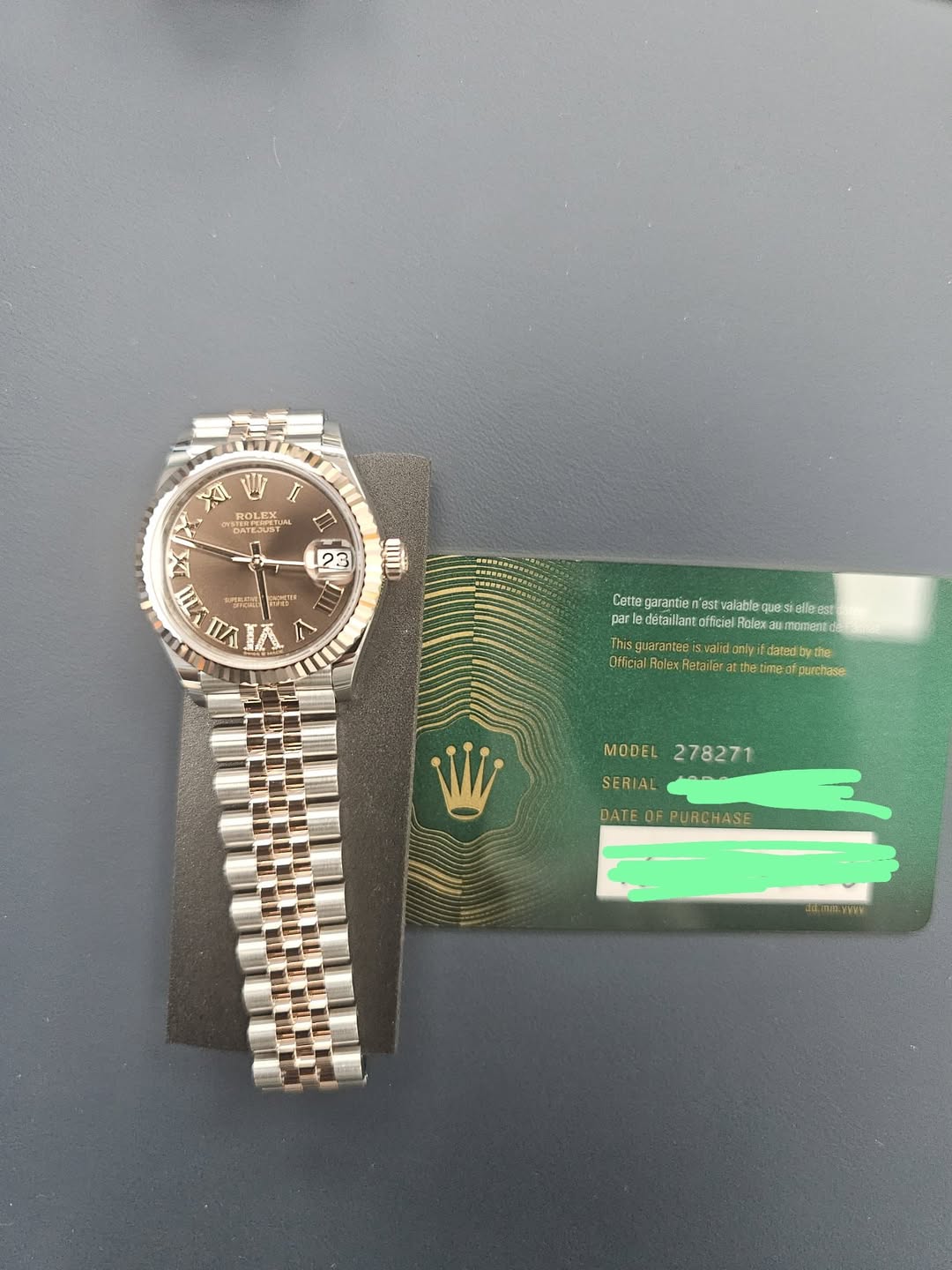 May be an image of wrist watch and text