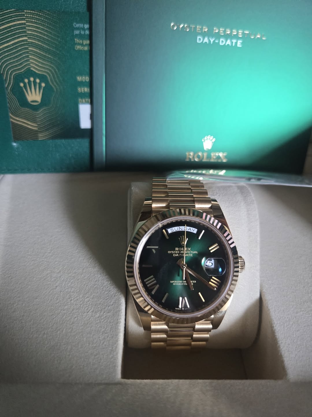May be an image of wrist watch and text
