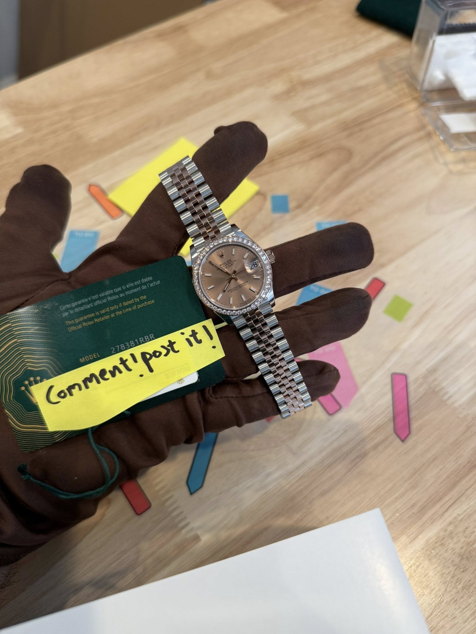May be an image of wrist watch and text