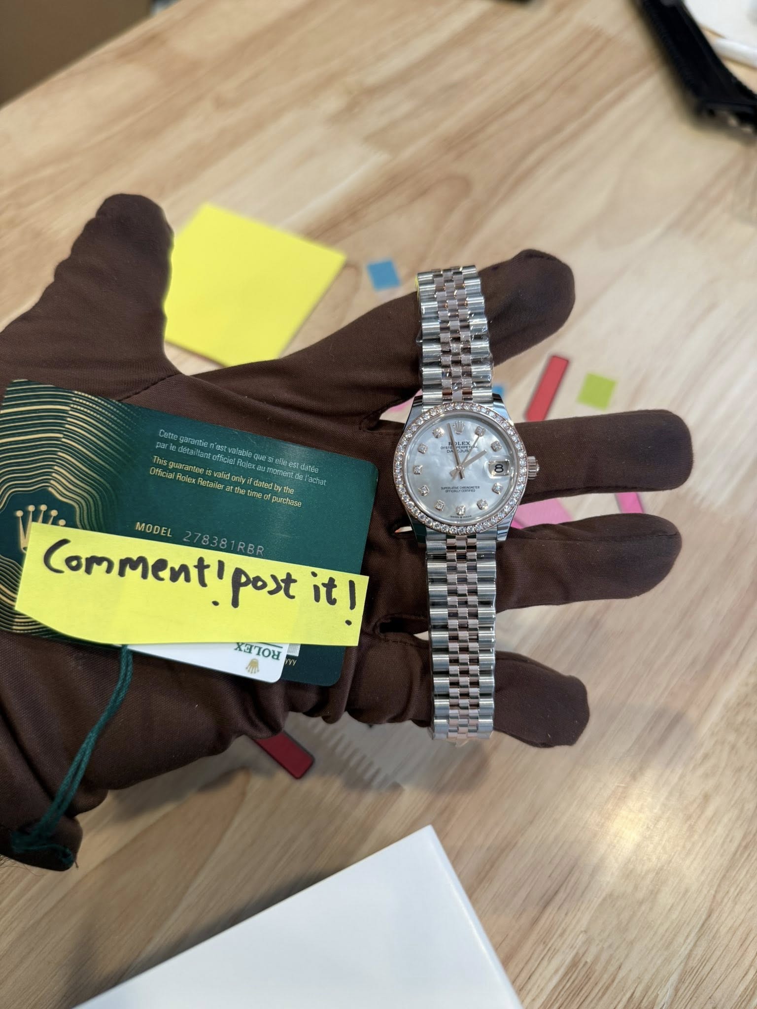 May be an image of wrist watch and text