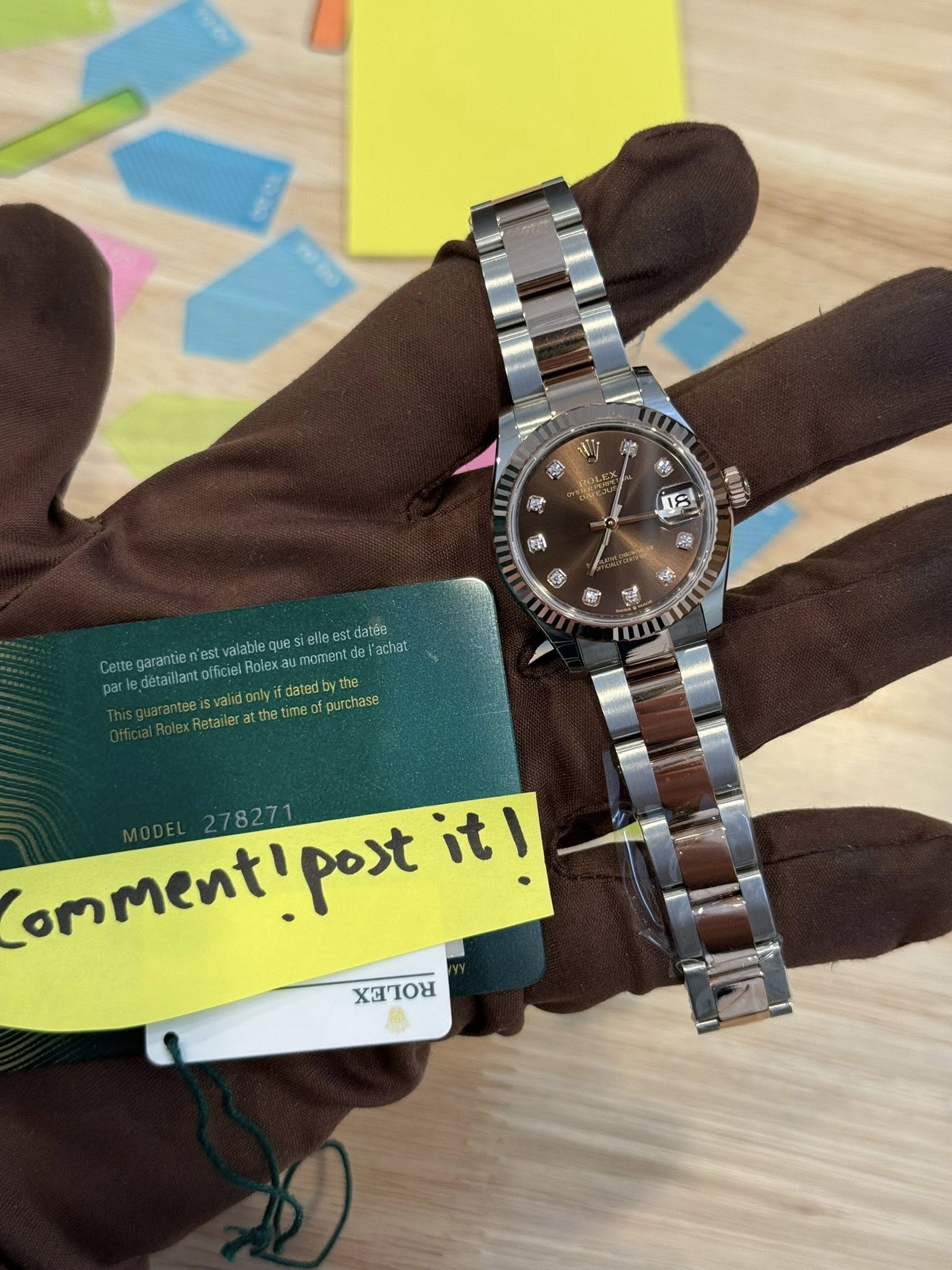 May be an image of wrist watch and text