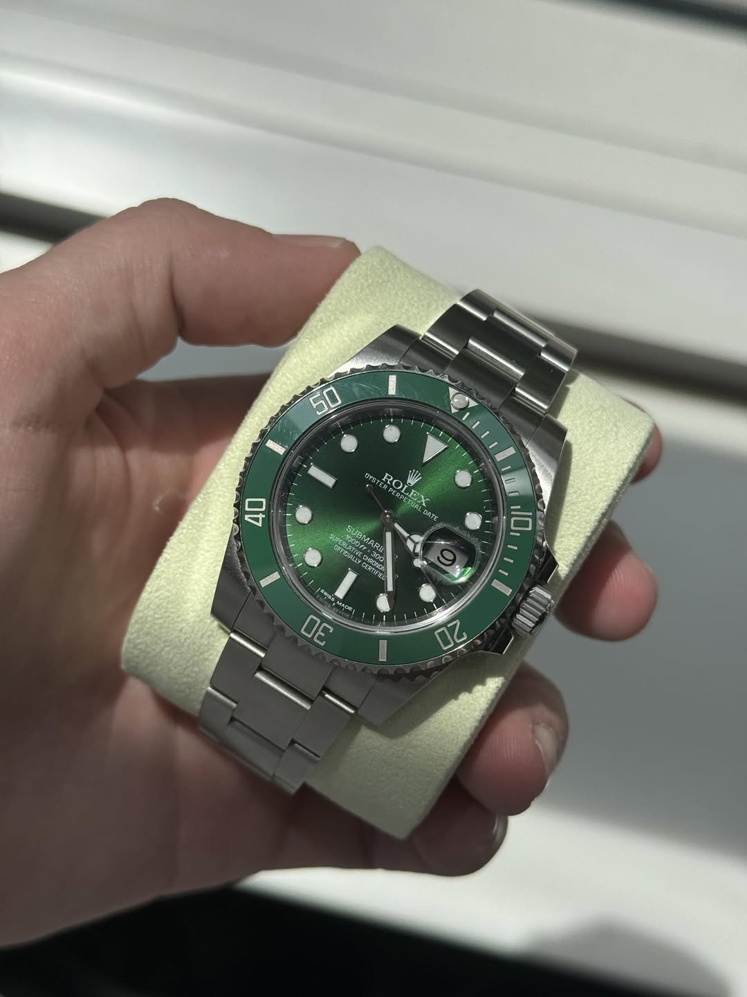 May be an image of wrist watch and text