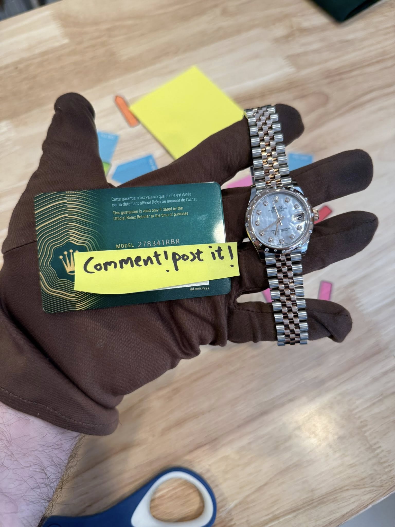 May be an image of wrist watch and text