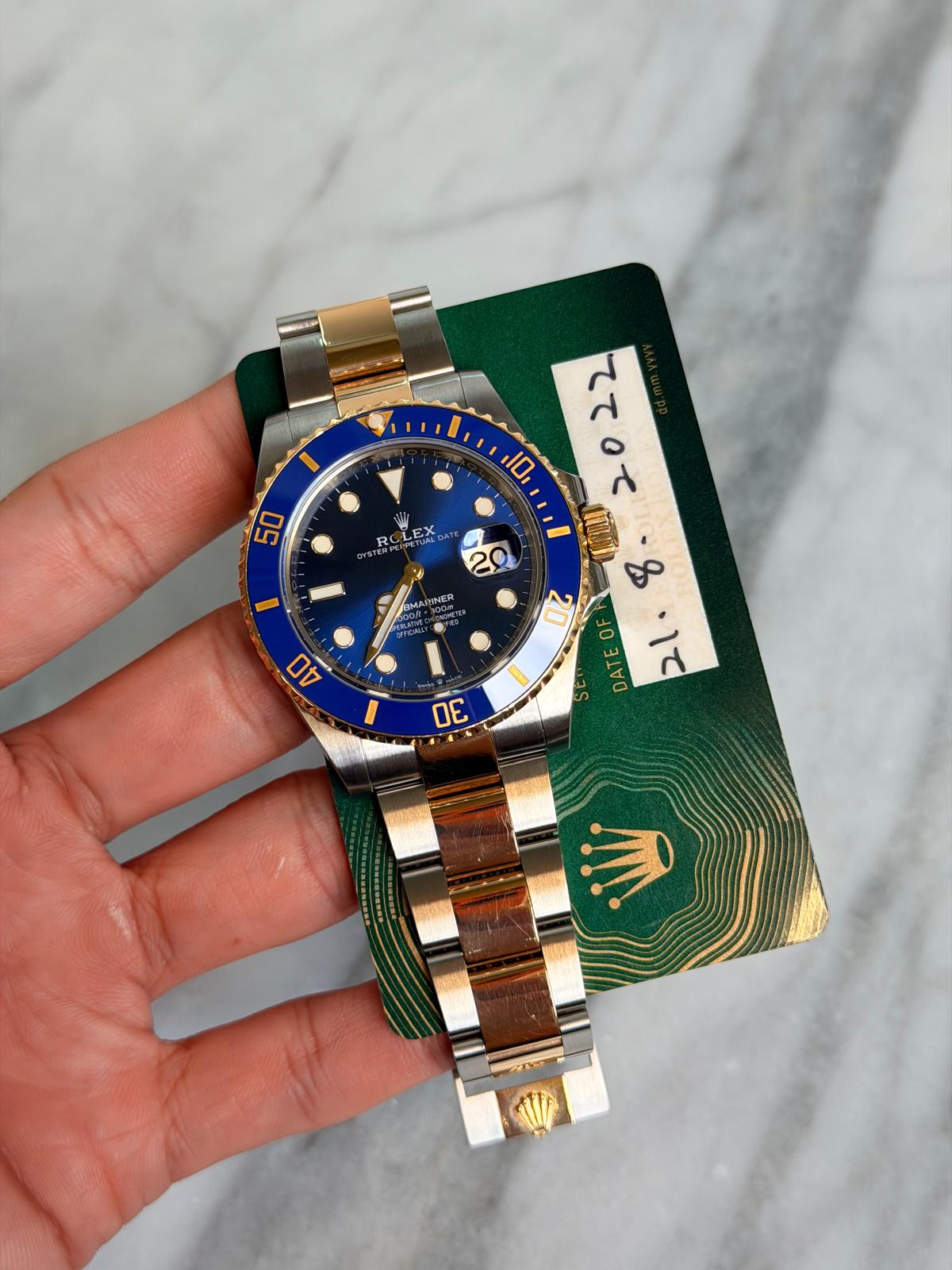 May be an image of wrist watch and text that says '50 RO EX 2 ٣ 10 0て ててて ኦ ٥ & 10 DAEE 1て 0 00 DE'