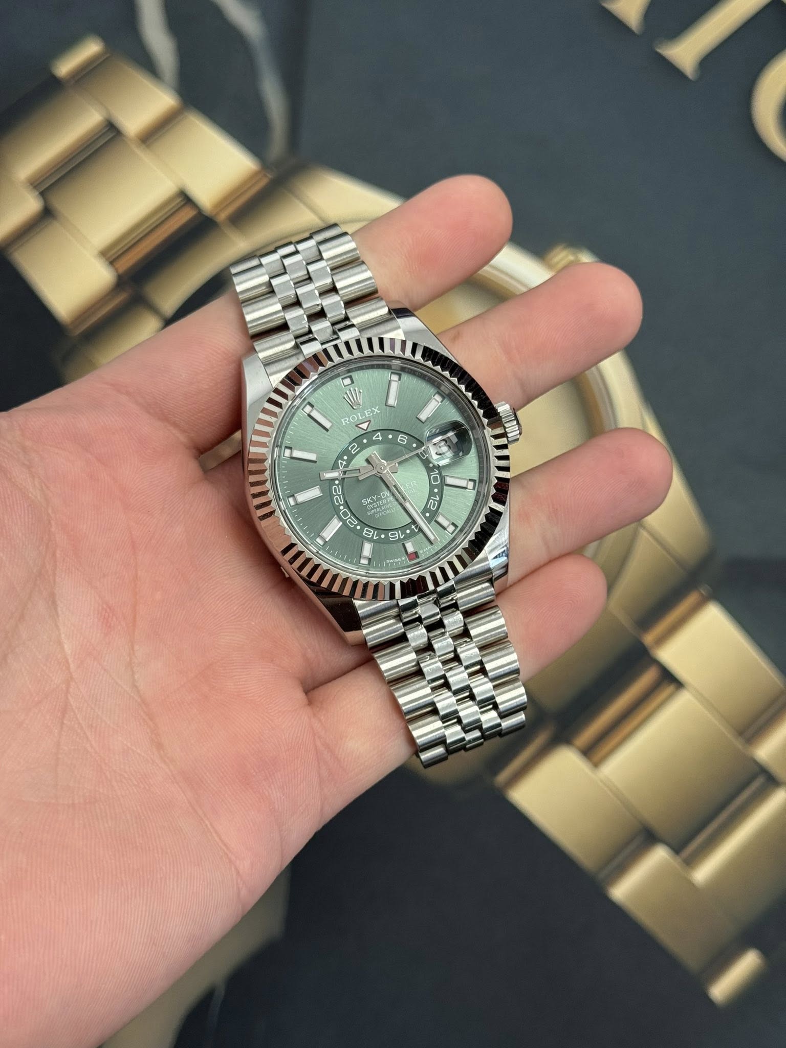 May be an image of wrist watch and text