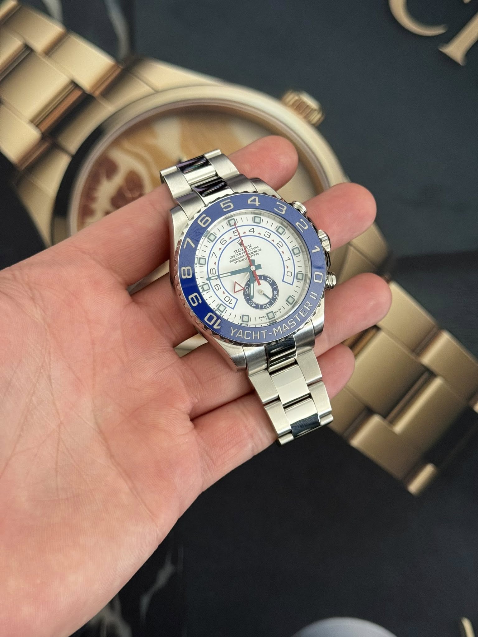 May be an image of wrist watch and text