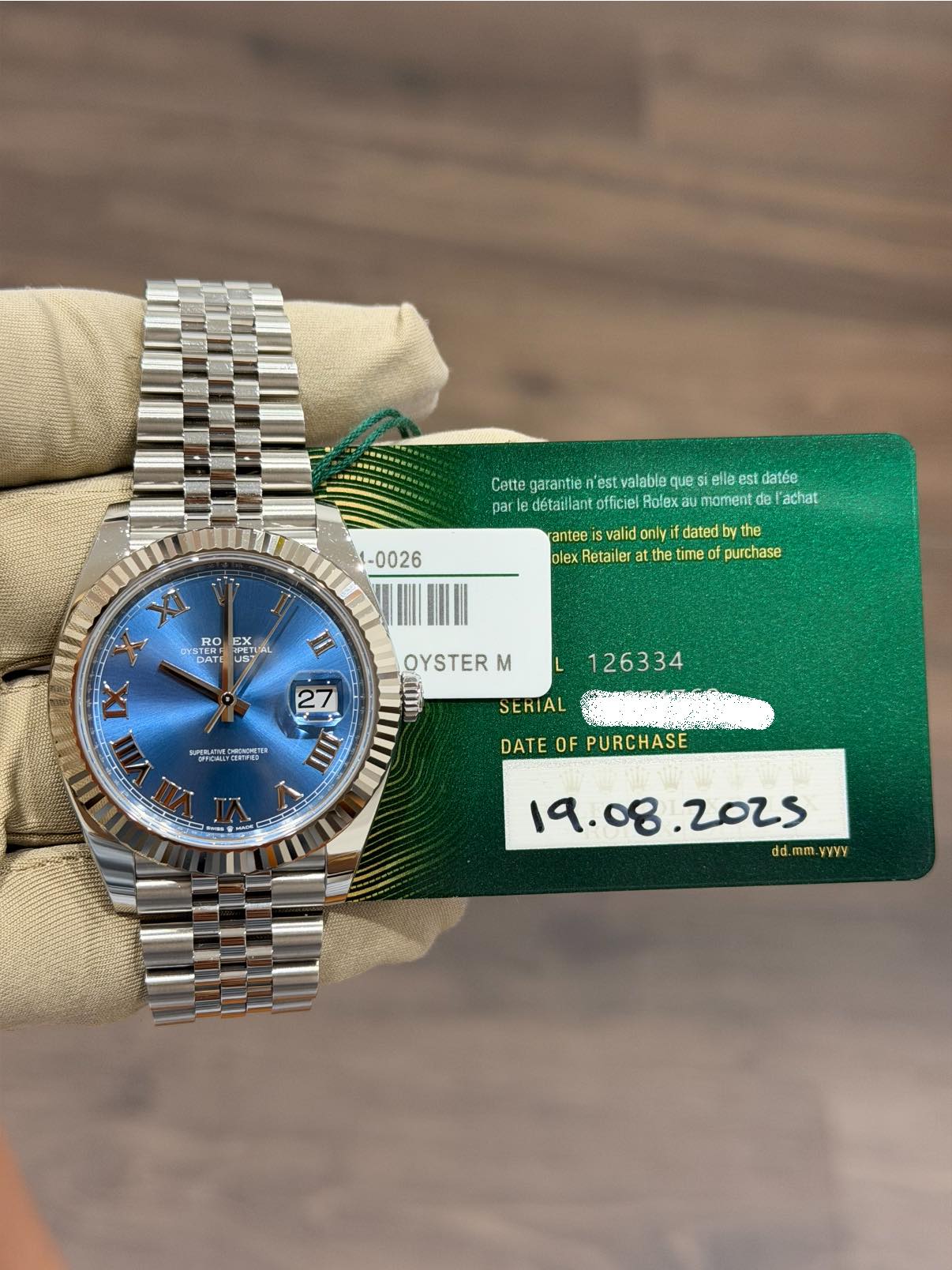 May be an image of wrist watch and text