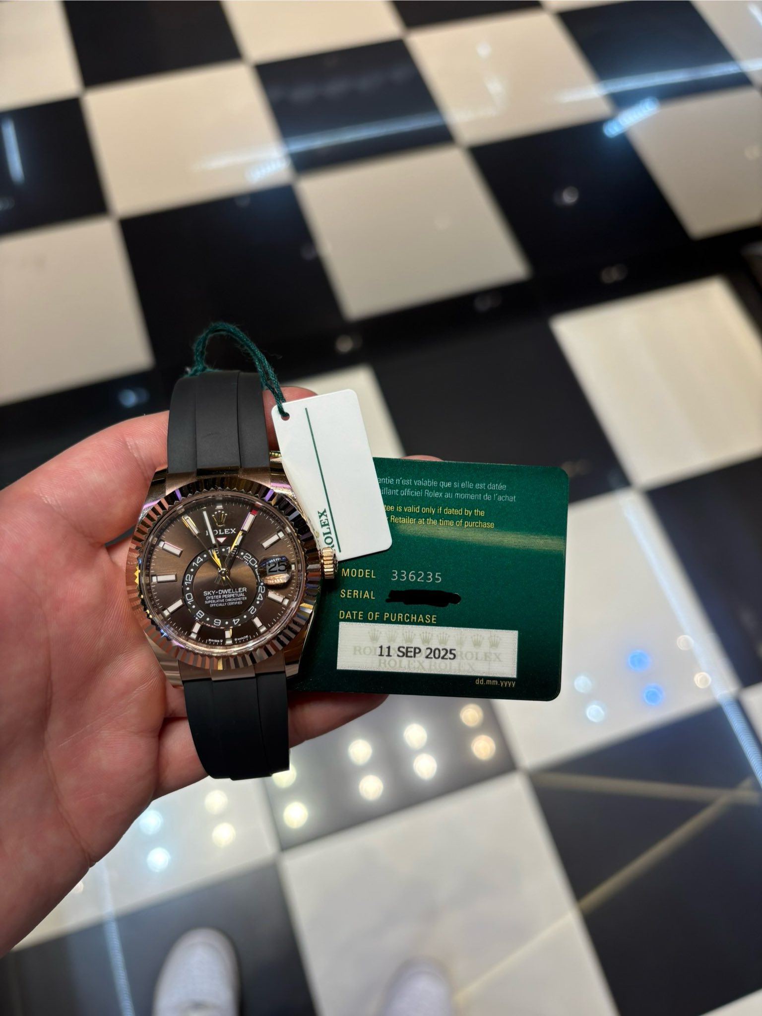 May be an image of wrist watch and text