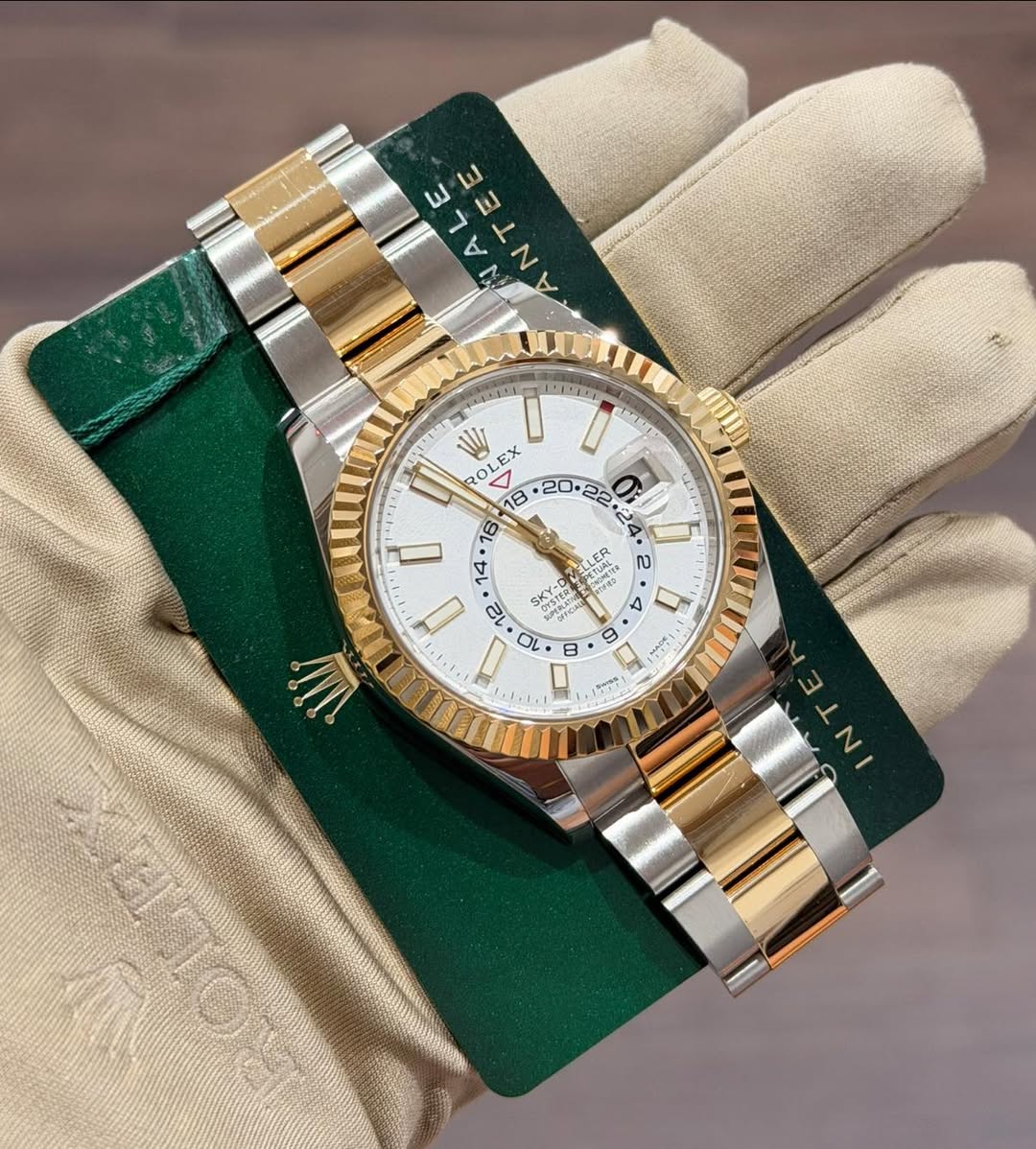 May be an image of wrist watch and text
