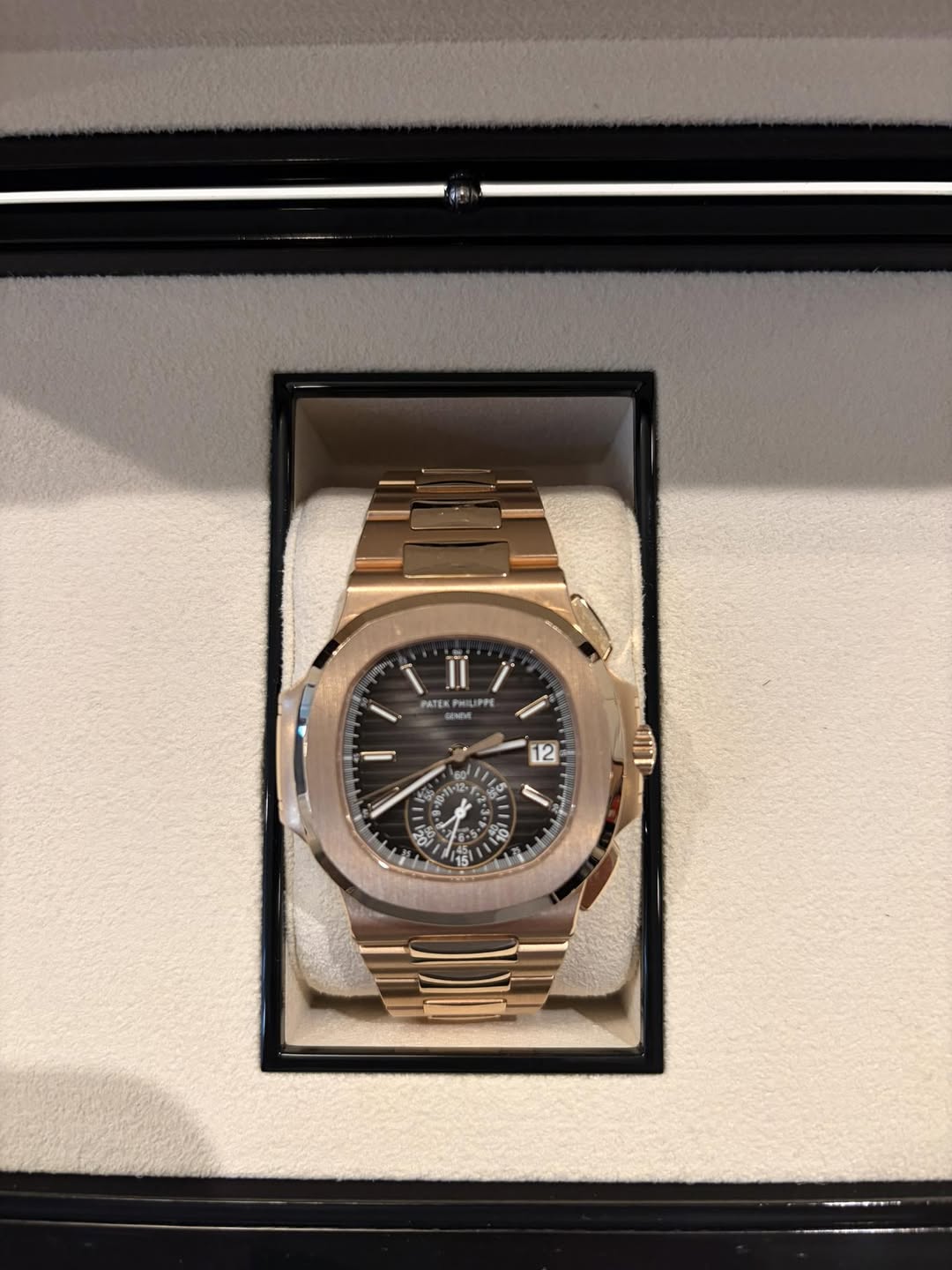 May be an image of wrist watch and text