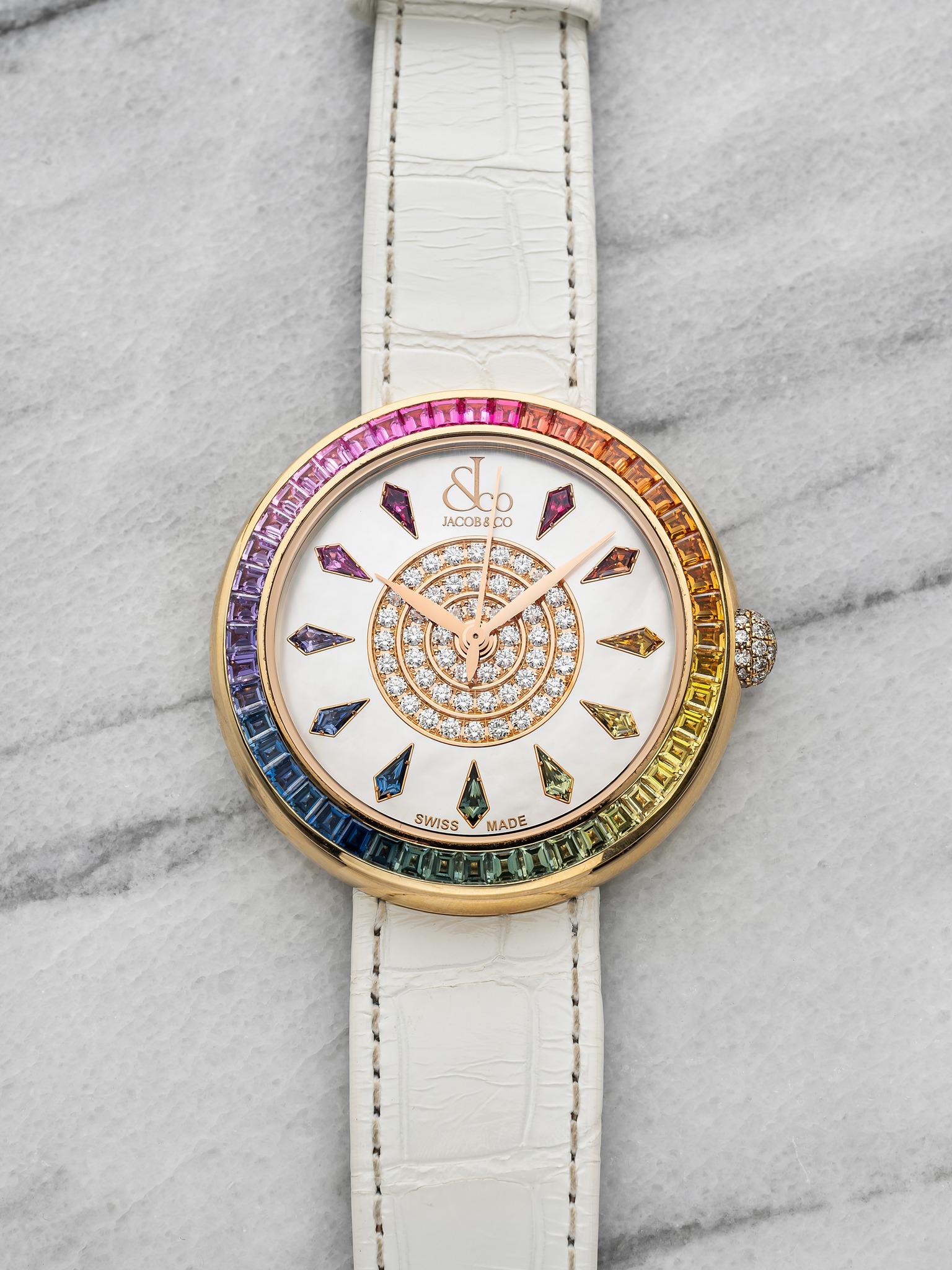 May be an image of wrist watch and text that says '&o лacoBa CO I SWISS MADE'