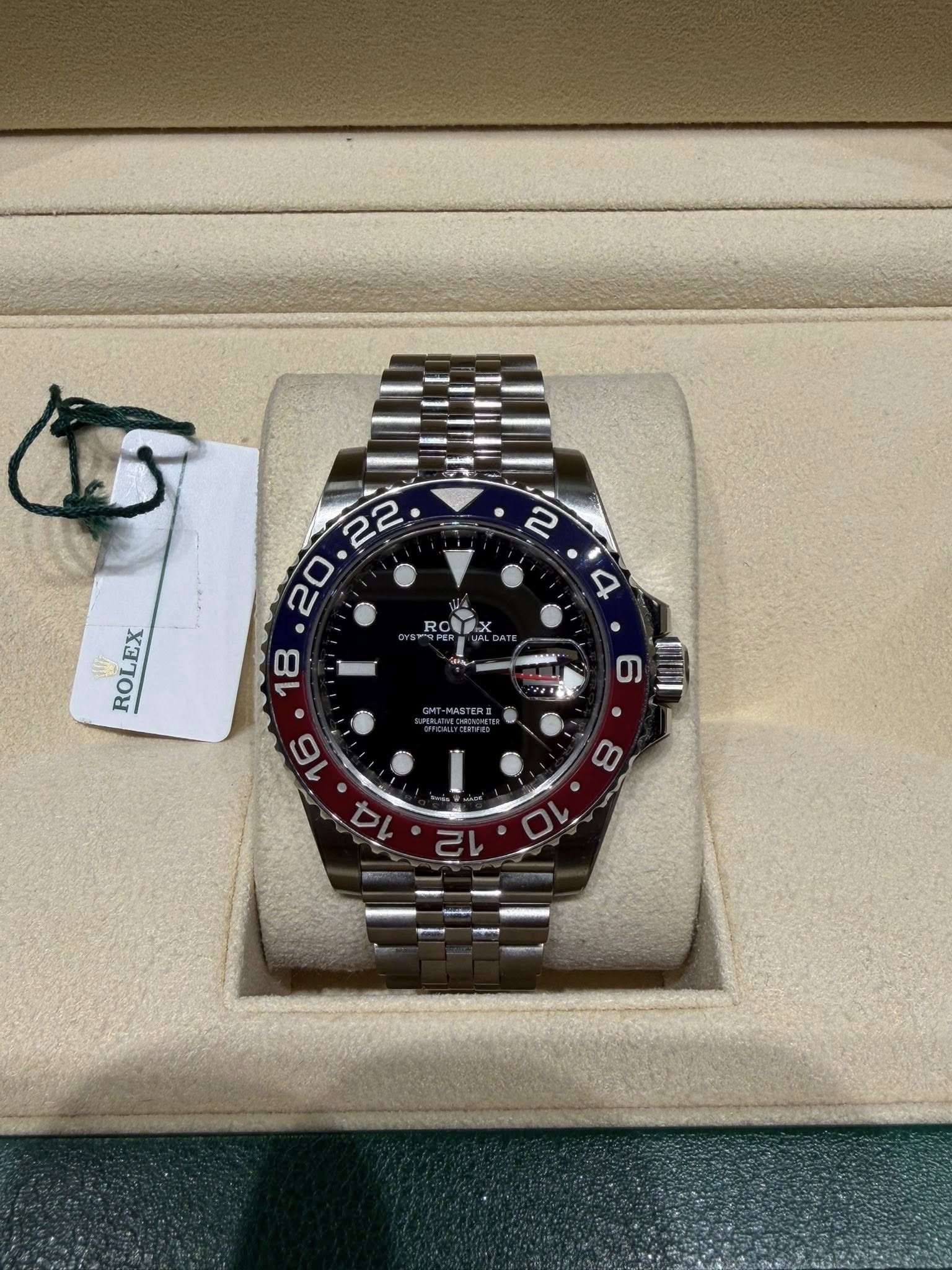 May be an image of wrist watch and text