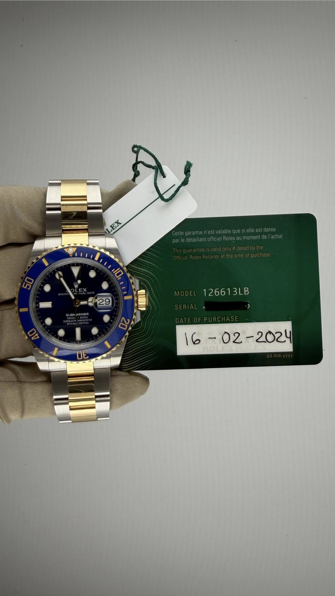 May be an image of wrist watch and text that says 'مرح LEX EX 29 126613LB 2661 利 '
