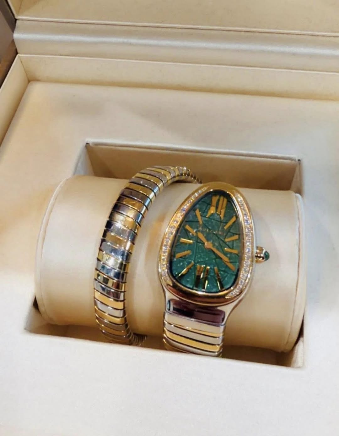 May be an image of wrist watch and jewelry