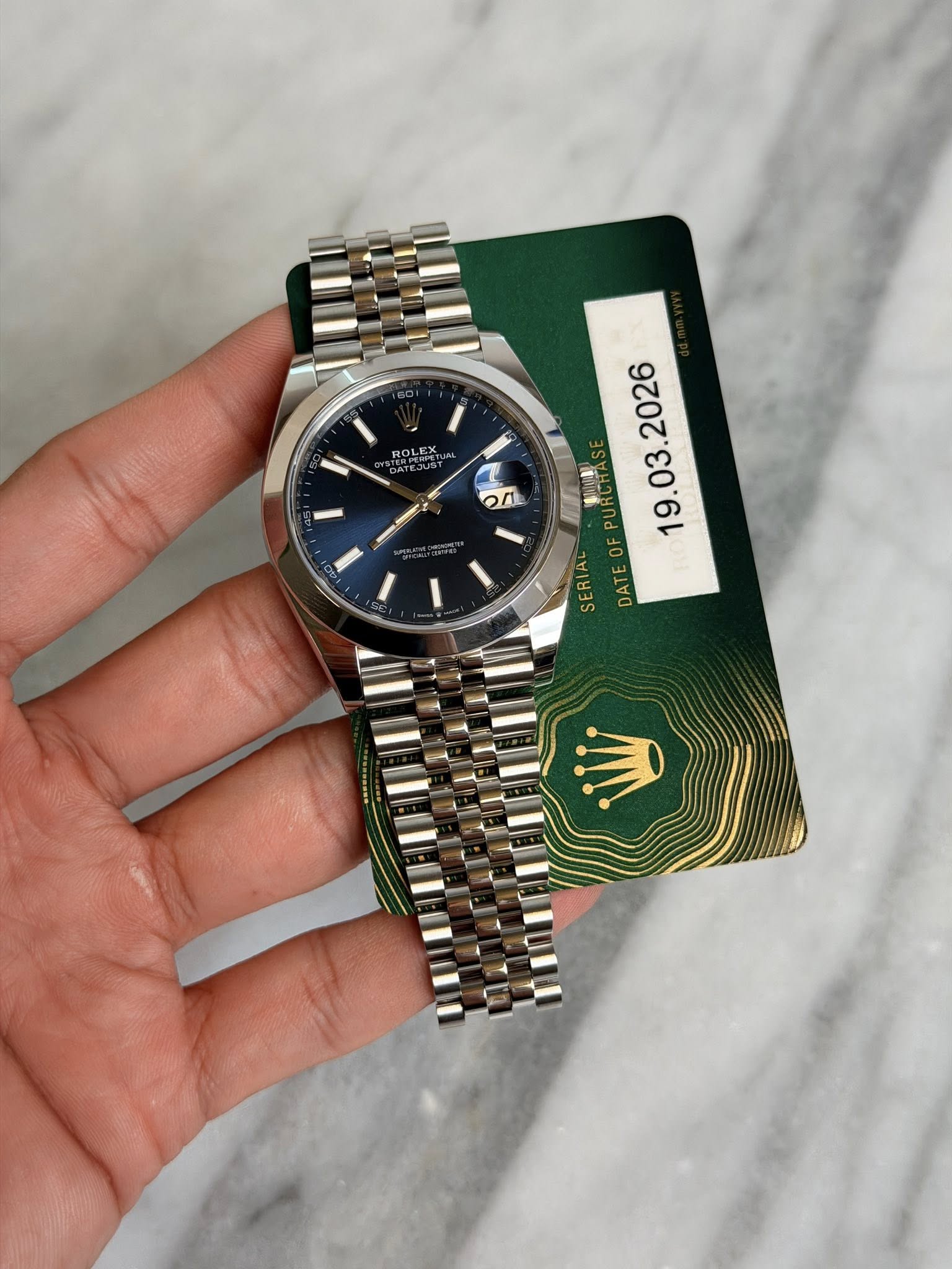 May be an image of wrist watch and text that says 'ROLLAN 1 on . SERIA DATE'