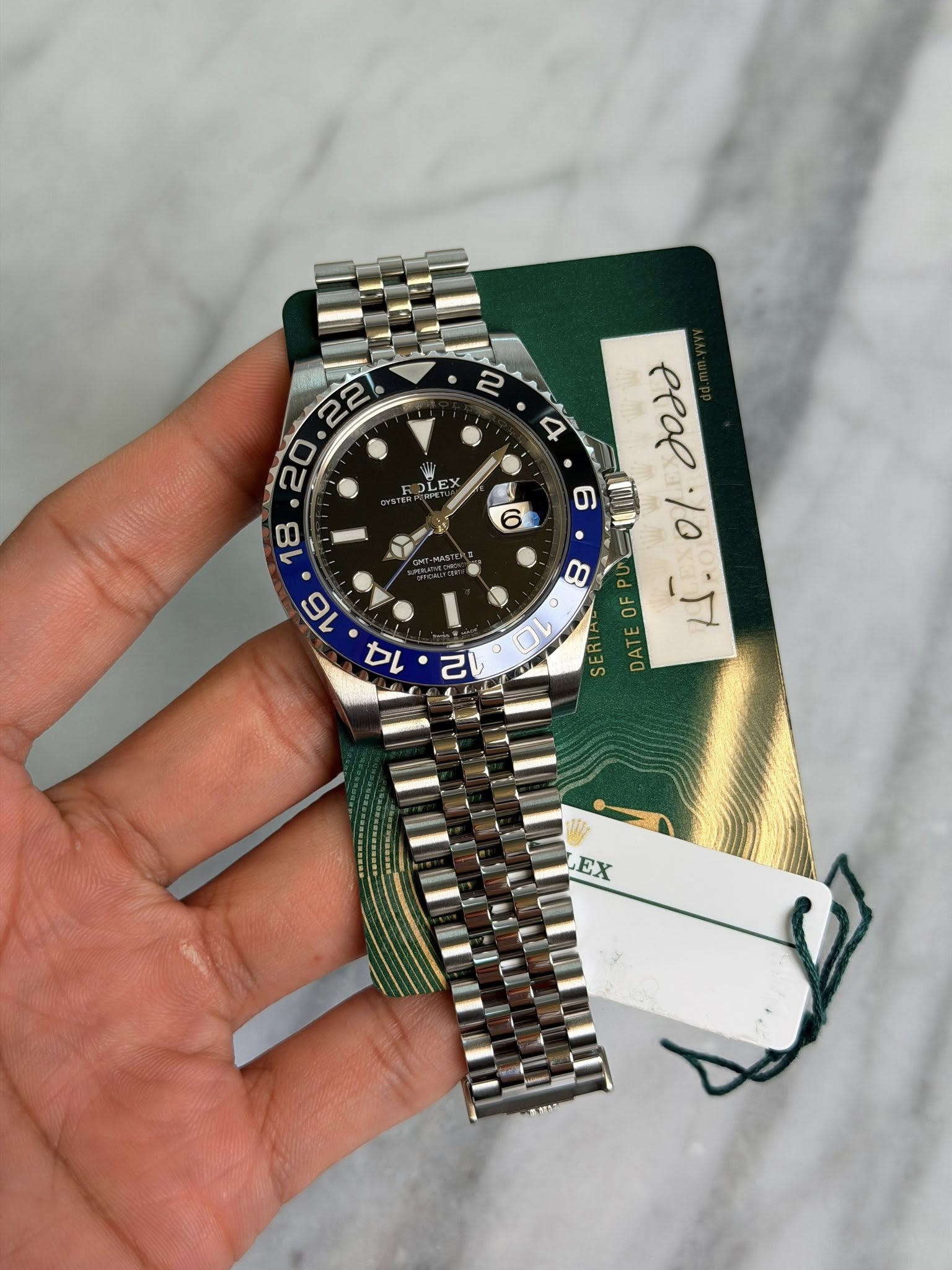 May be an image of wrist watch and text that says '2 4 OLE و 00 O OL eeal 10 ن 10-5 30 DATE 2 E EX'