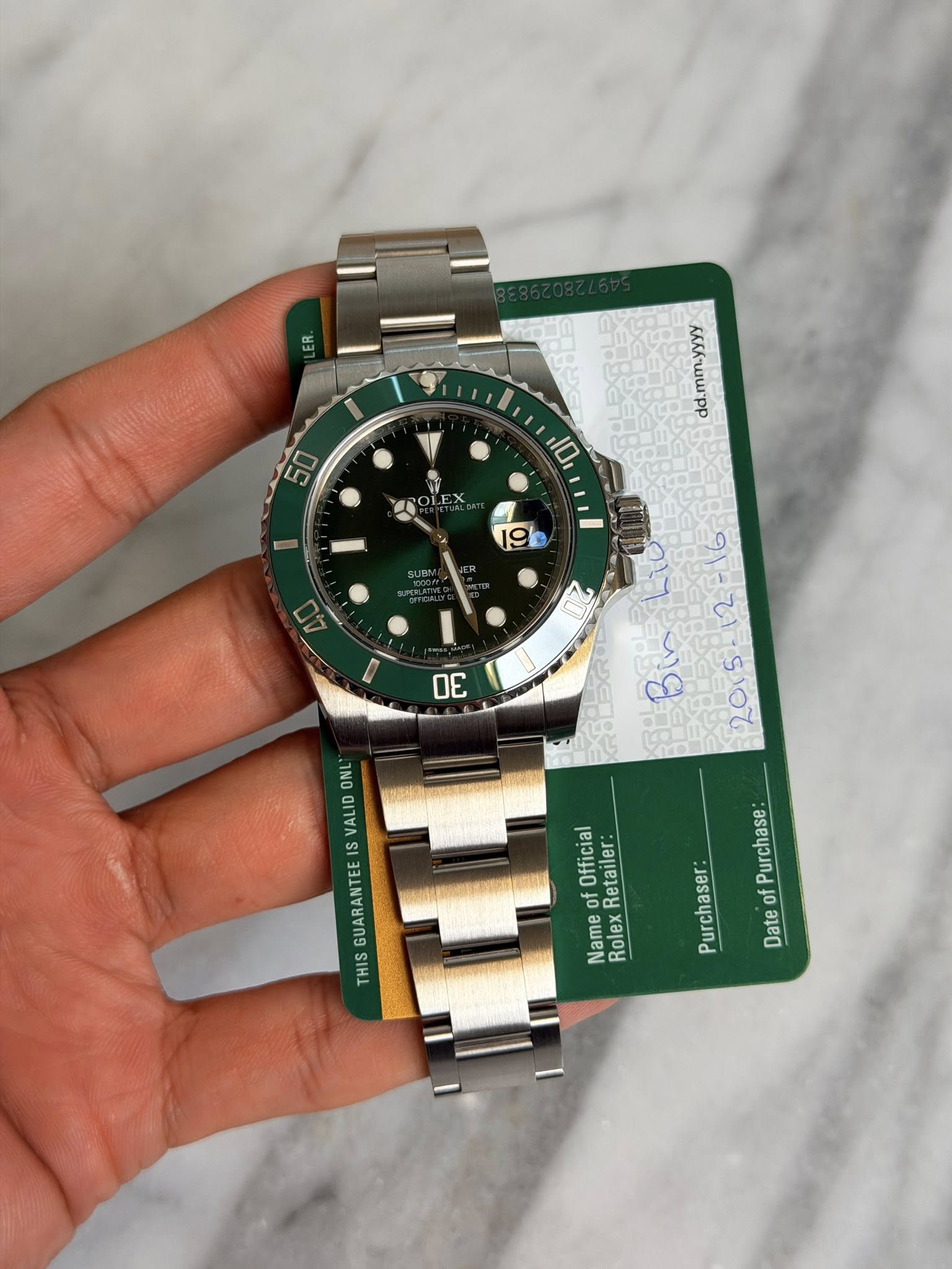 May be an image of wrist watch and text that says '50 DL KAKKиwpp 19 OE ONL VALID GUARANTEE THIS 110 2802 yg ငွ 91:21-502 10z סיירום Official Purchase of Name RolexRetailer:…