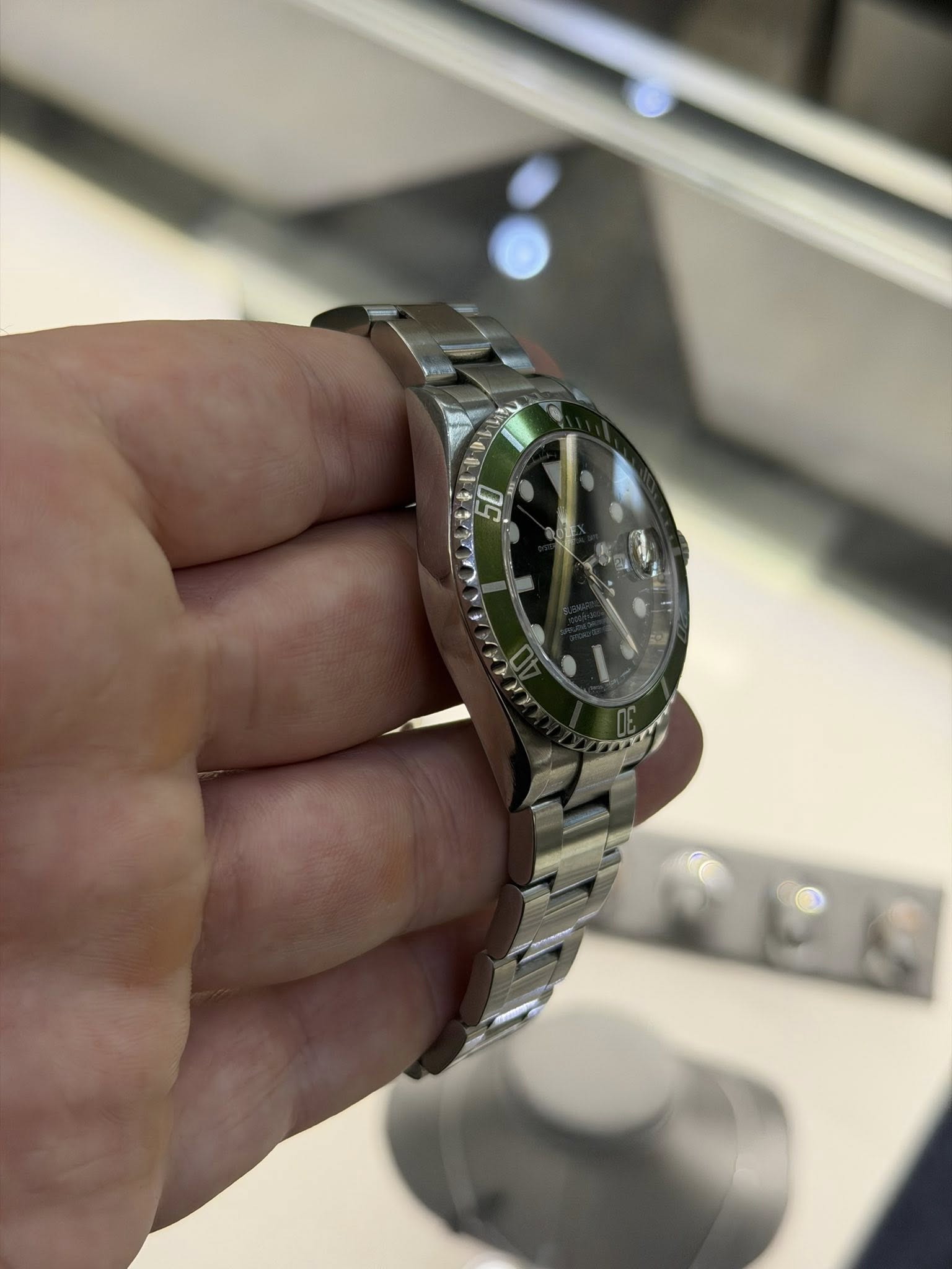 May be an image of wrist watch and text