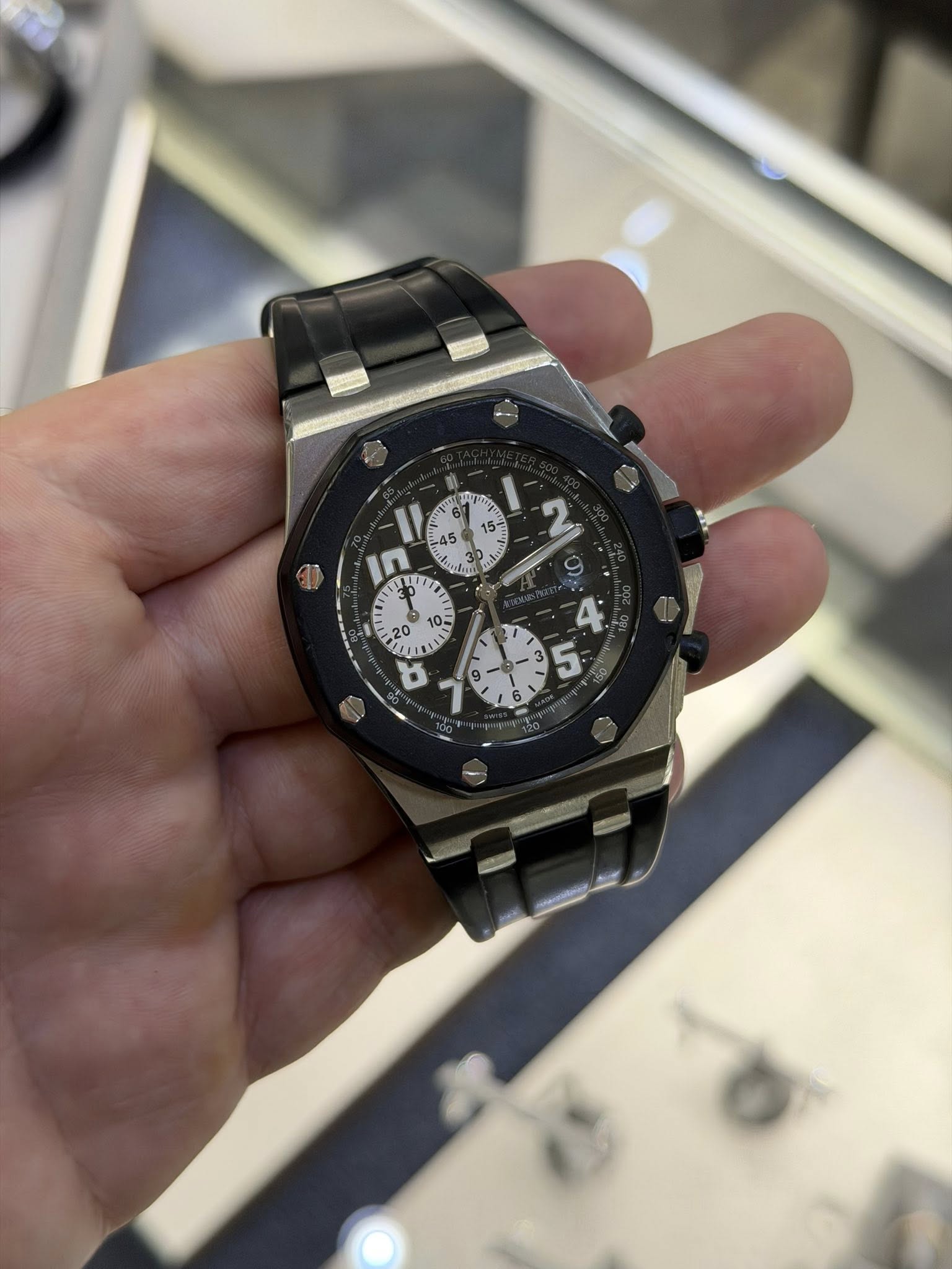 May be an image of wrist watch and text