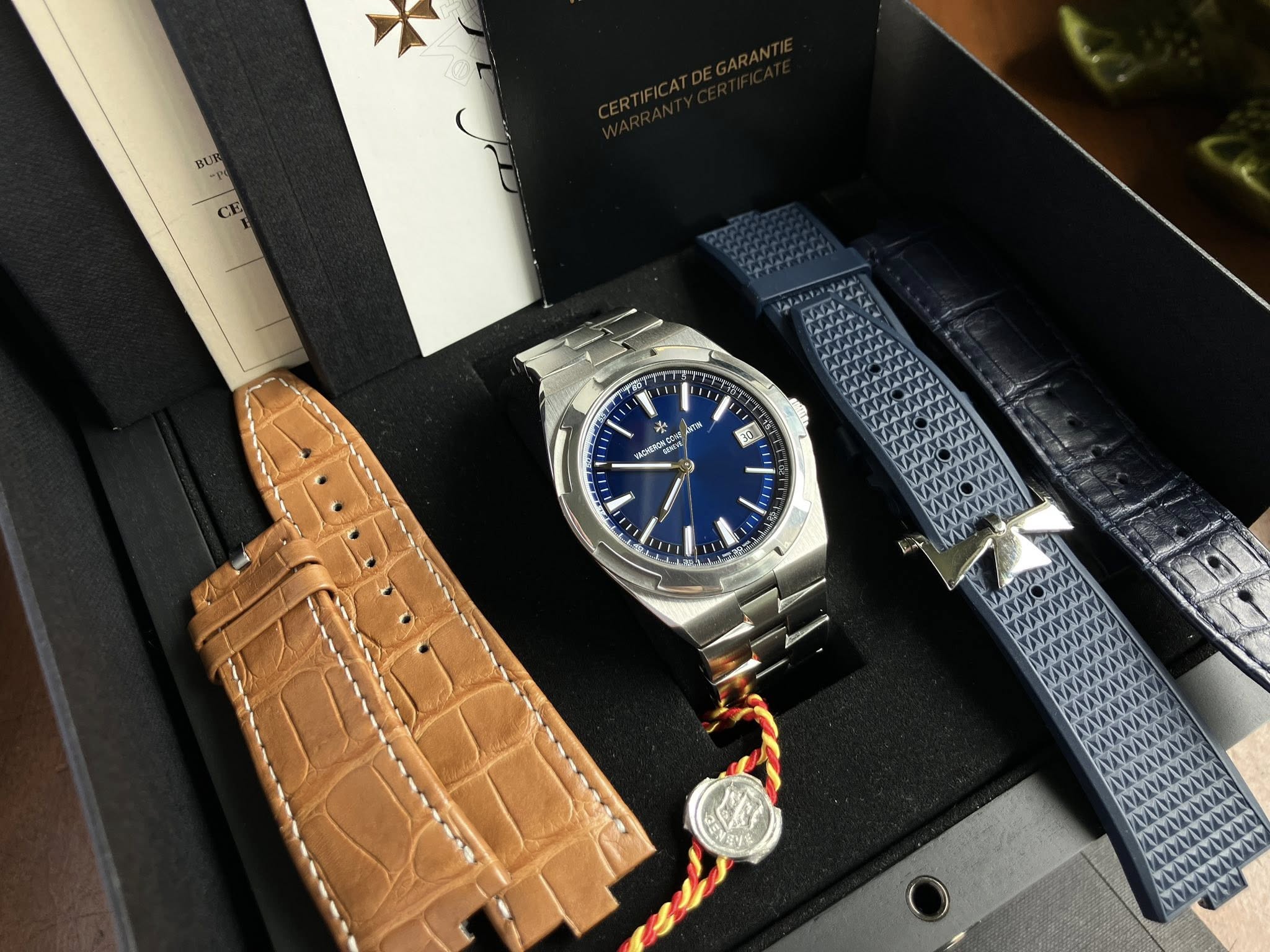 May be an image of wrist watch and text