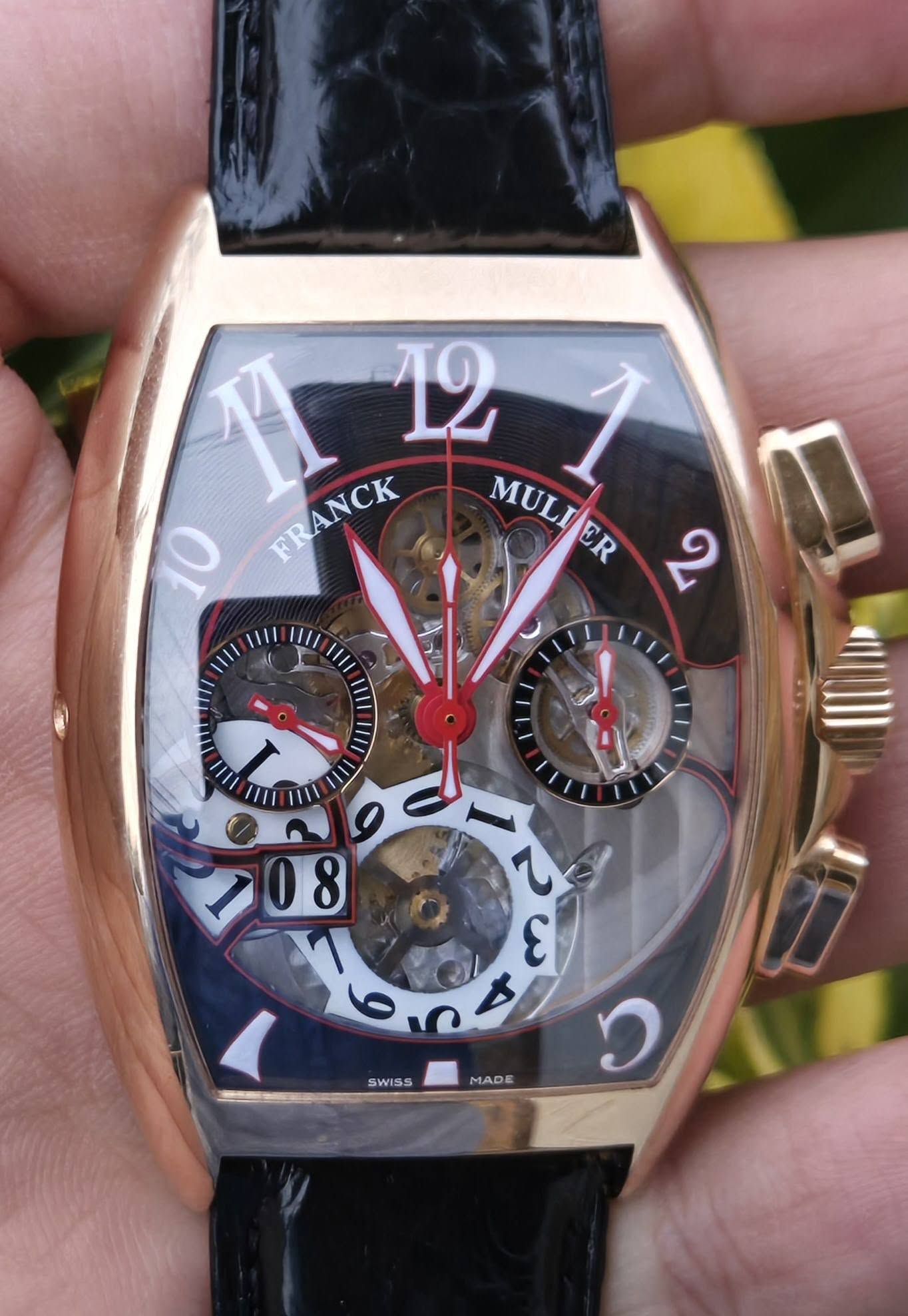 May be an image of wrist watch and text that says 'TI 12 10 FRANCK FRANCK MULTJER MULIER ១ 1|/ 1I1/ 1I// 1I/ 1II I หบ II 1 川 日 9 08 8 عحممه ε SWISS MADE ن'