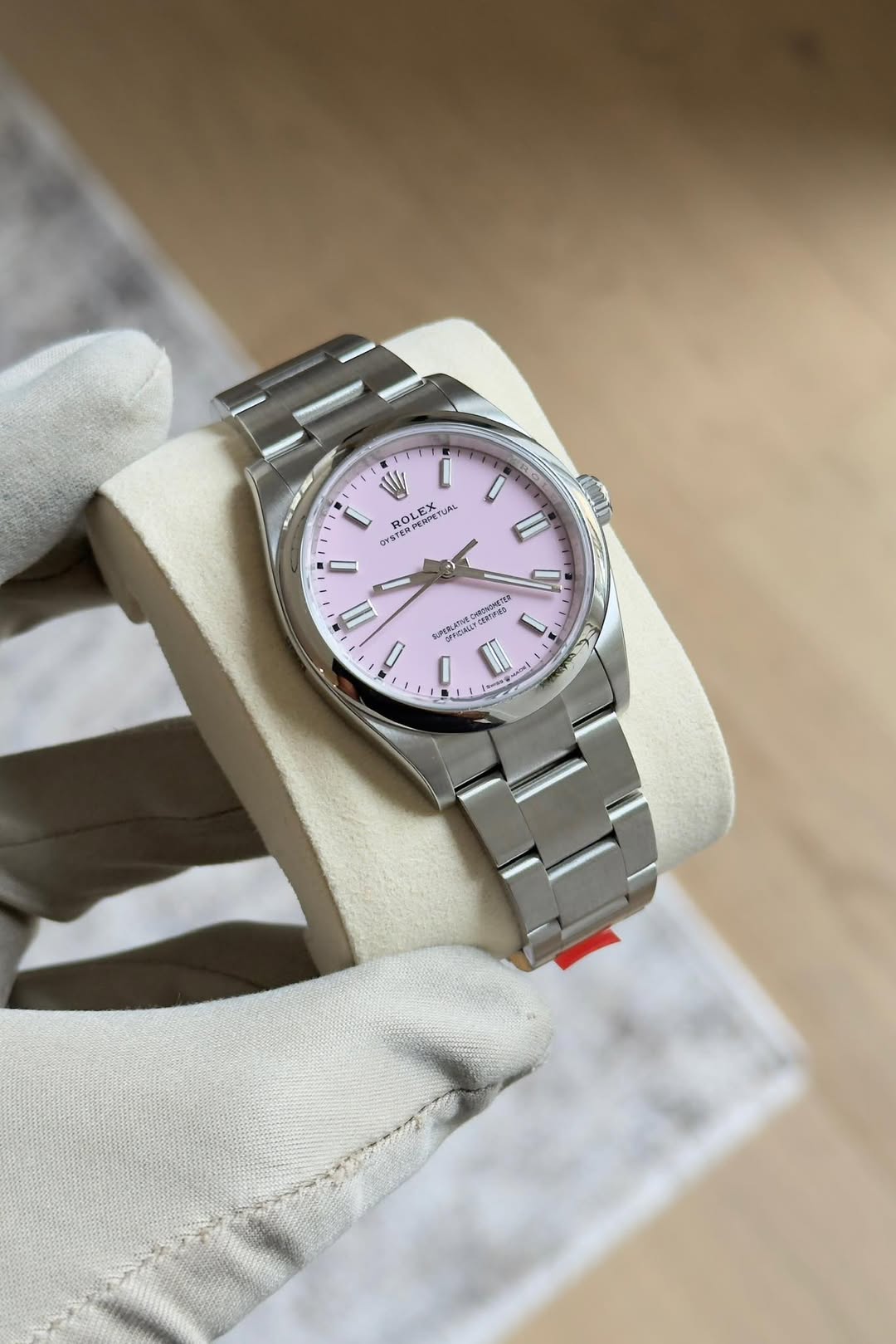 May be an image of wrist watch and text