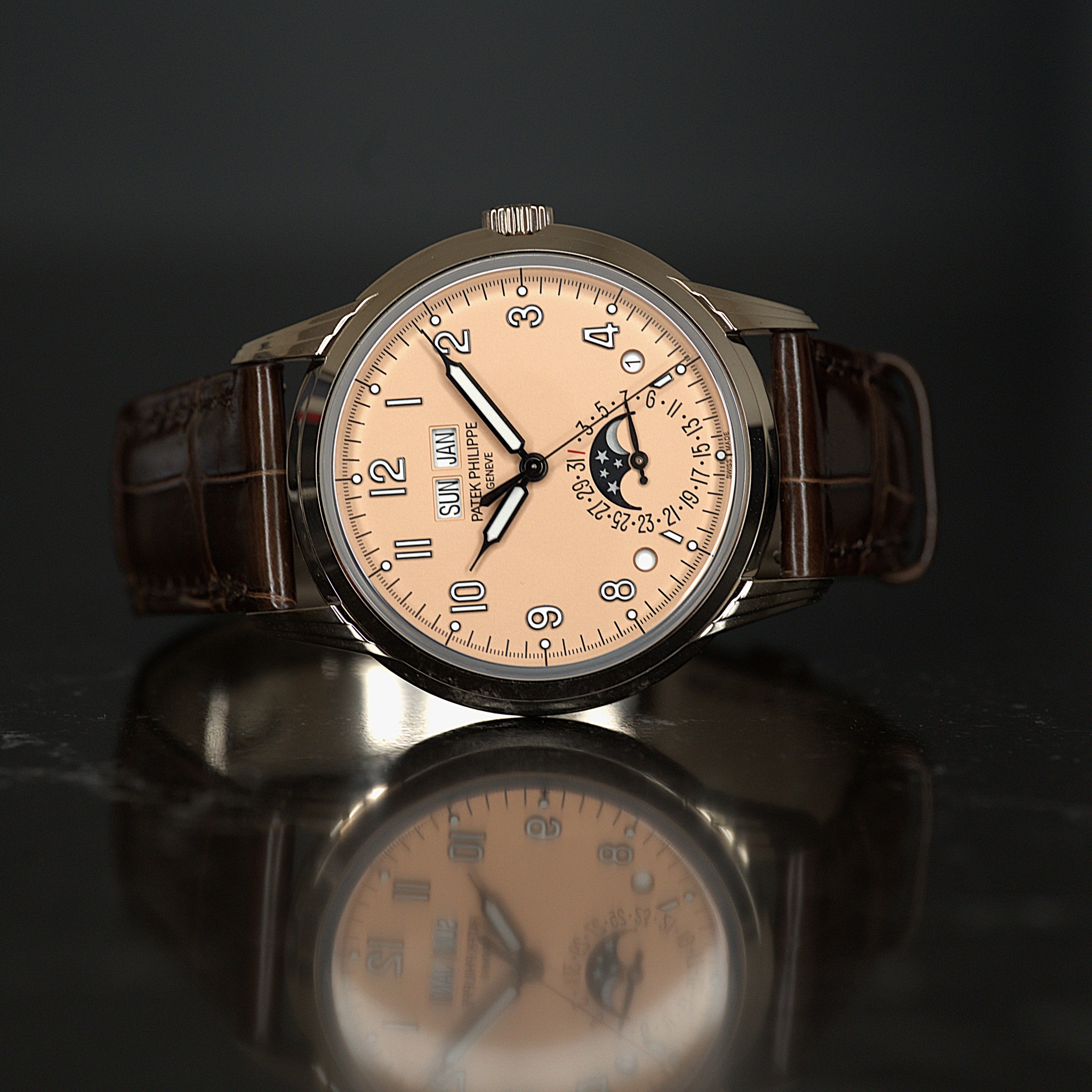 May be an image of wrist watch and text