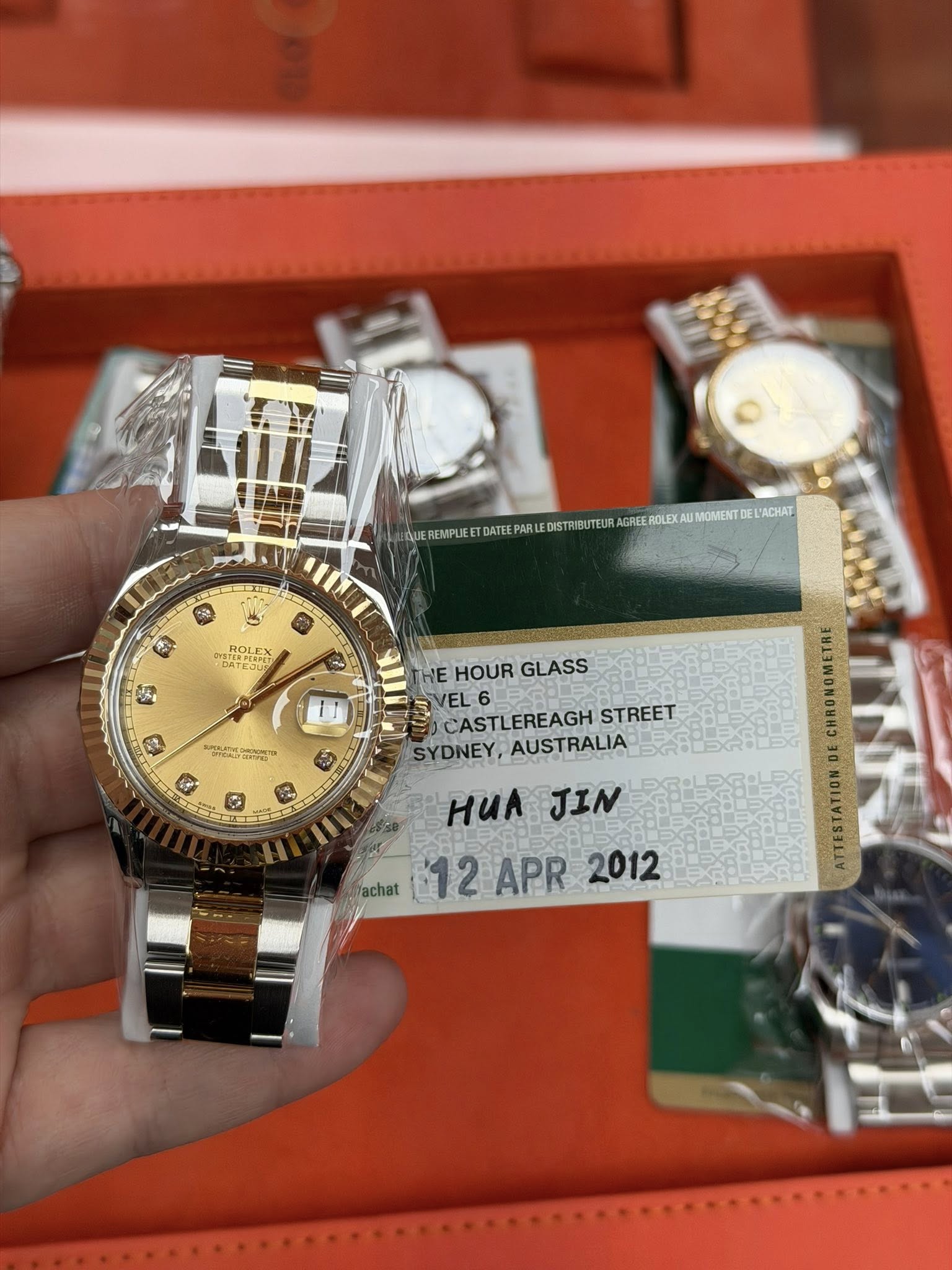 May be an image of wrist watch and text